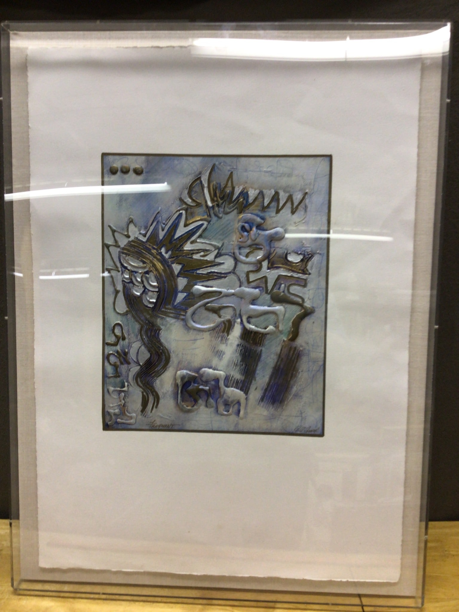 Hand-Painted Mixed Media Artwork Signed 'Fragment' by Unknown Artist: This is a framed hand-painted mixed media artwork titled 'Fragment' with an abstract design in blue, white, and metallic tones. The piece includes textured, raised elements and is signed in the lower-