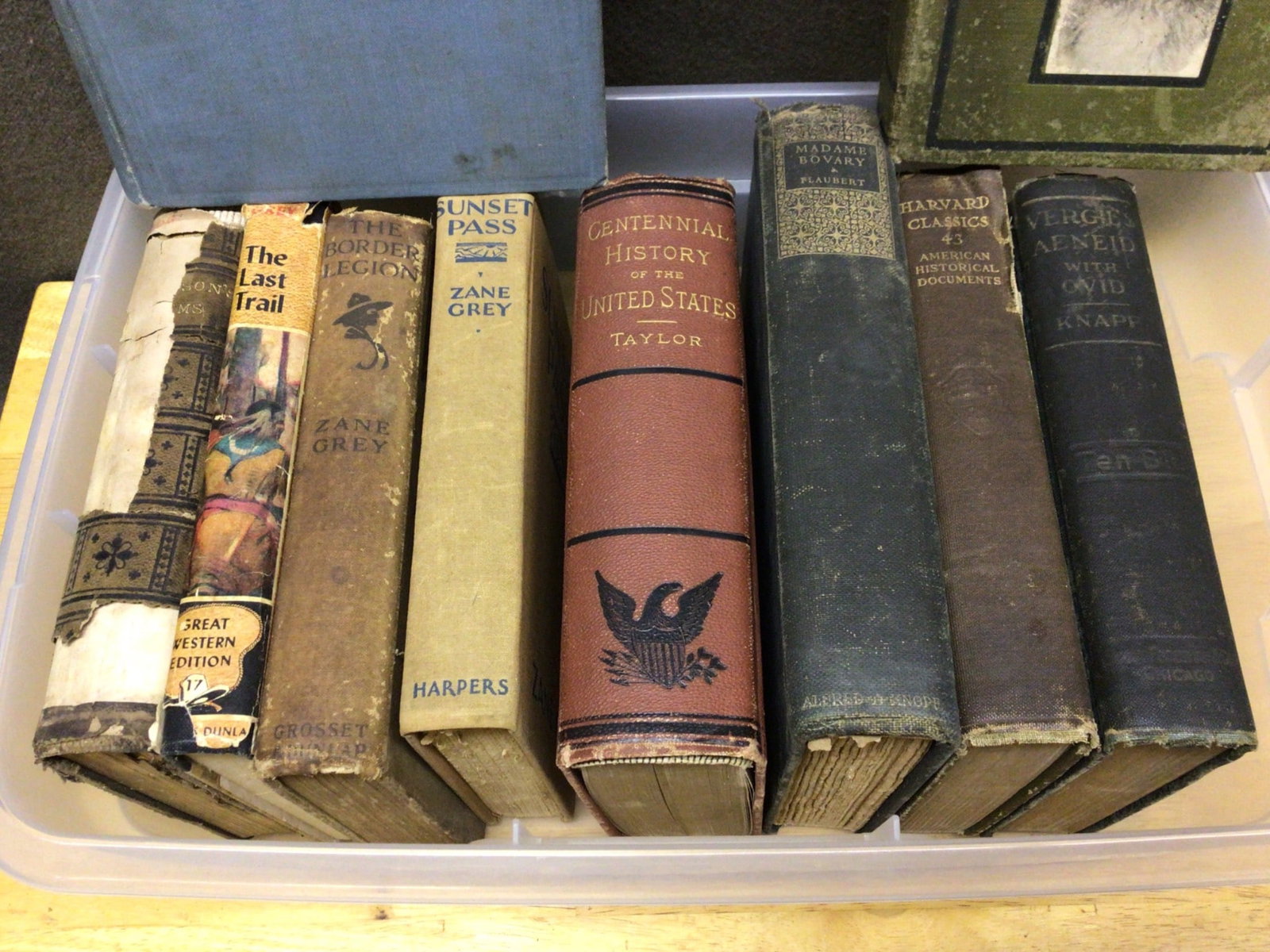 Books by Various Authors Including Zane Grey and Alfred Ollivant: This is a lot of books including titles such as 'Bob, Son of Battle' by Alfred Ollivant, multiple novels by Zane Grey (e.g., 'The Last Trail,' 'Border Legion,' 'Sunset Pass'), and 'Centennial History 