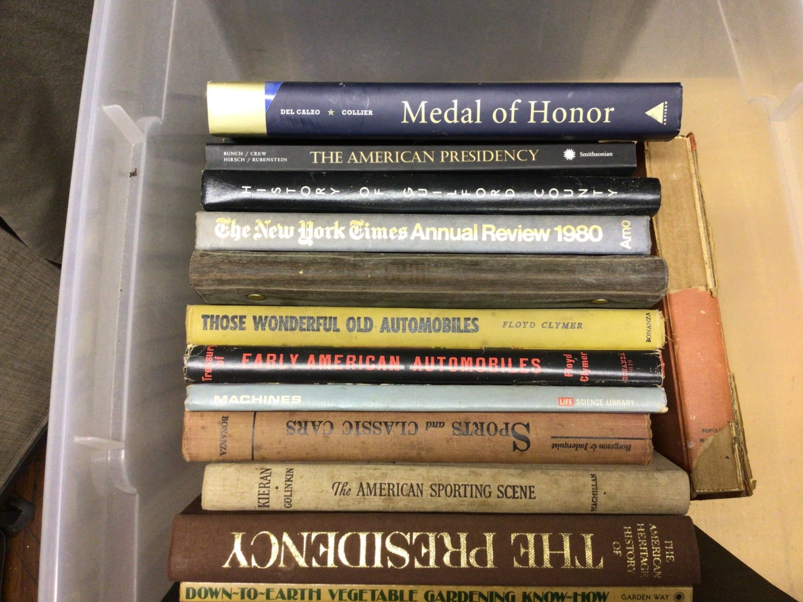 13 Books About American History, Automobiles, and Gardening: This lot includes 13 books focusing on diverse topics such as American history, automobiles, and gardening. Notable titles include 'Medal of Honor' by Del Calzo & Collier, 'The American Presidency' by