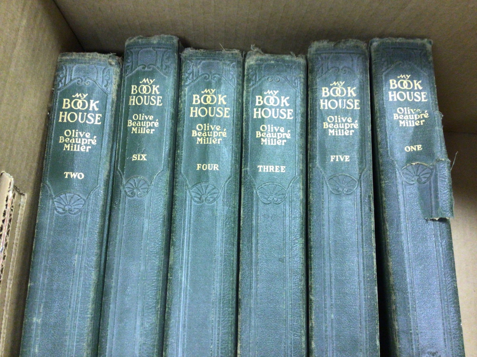 'My Book House' by Olive Beaupre Miller, Volumes 1-6: This lot includes six volumes (1 through 6) of 'My Book House' by Olive Beaupre Miller, published by The Book House for Children. The decorative hardcover set appears intact, with visible wear to the 