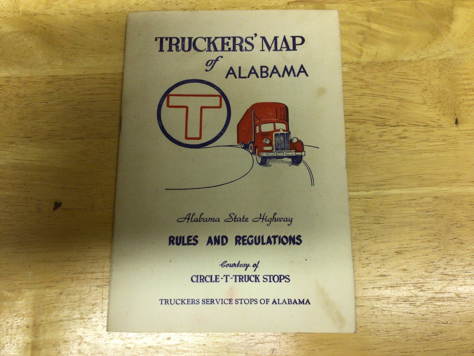 Truckers' Map of Alabama With Rules and Regulations: This lot includes a "Truckers' Map of Alabama," issued by Circle-T Truck Stops. The map features highway rules and regulations and includes advertisements for Dorsey Fleet Chief Lightweight Vans, Laws