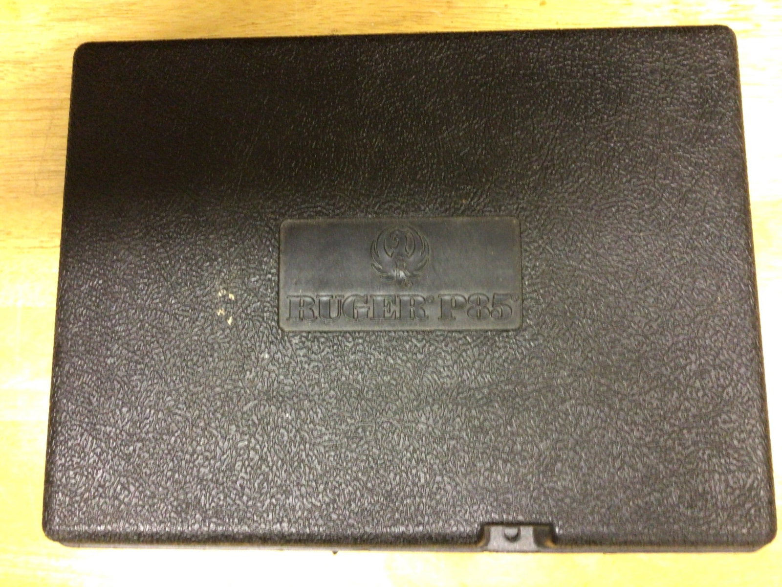 Ruger P85 Hard Plastic Case With Instruction Manual: This listing includes a hard plastic case for the Ruger P85 automatic pistol. The case is designed to securely hold the firearm and its accessories. Included is the original instruction manual for