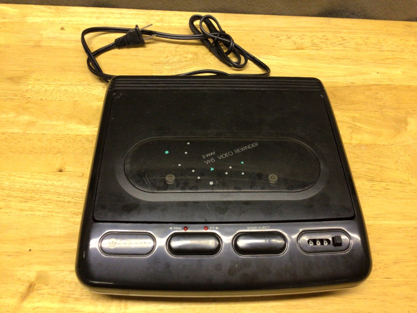 Kinyo Auto-Reverse Cassette Tape Player and Recorder: Kinyo auto-reverse cassette tape player and recorder. Features 3 primary control buttons including play, stop/eject, and auto-reverse functionality. Includes a built-in power cord. The unit shows exte