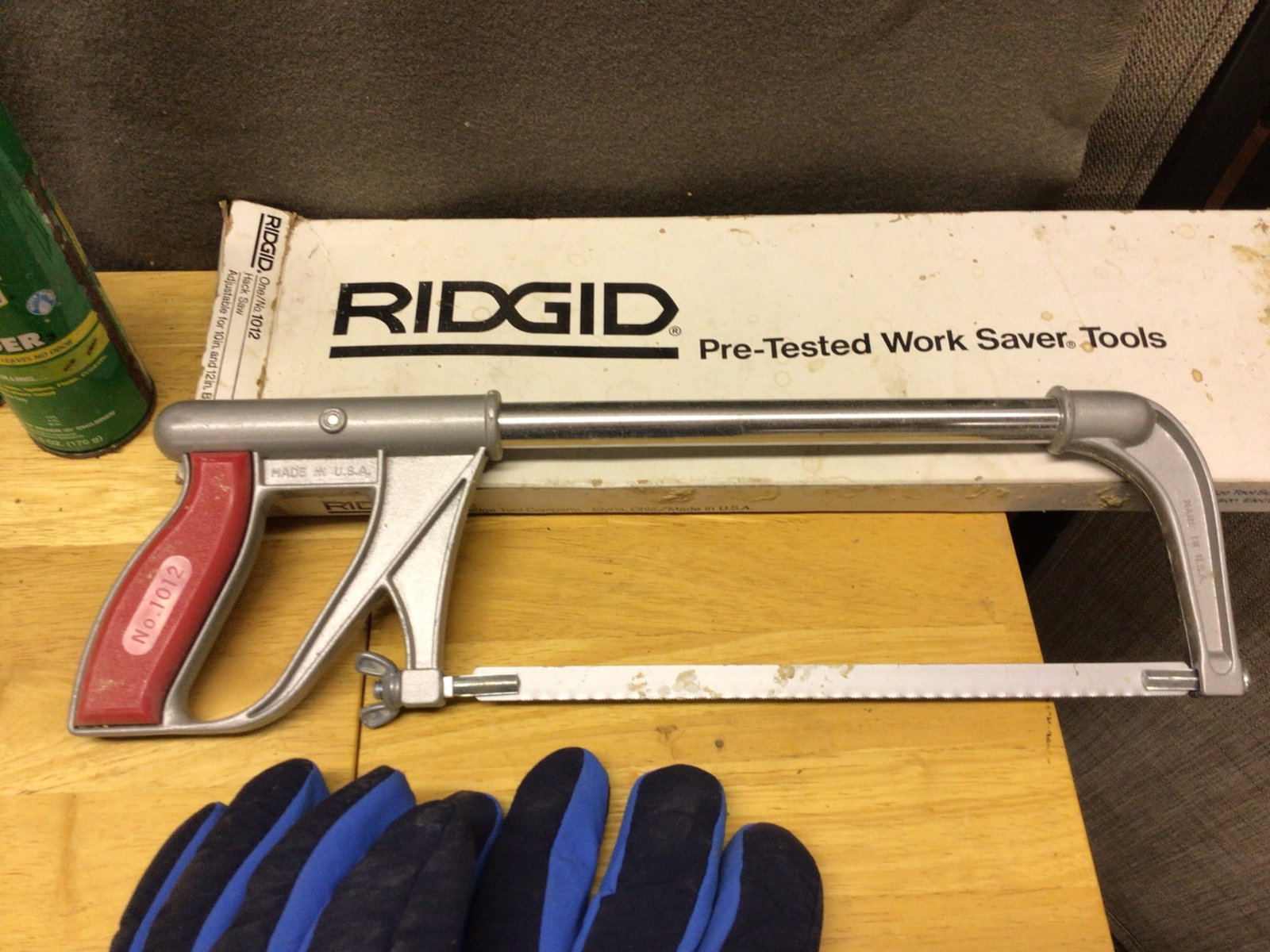 Tools and Accessories Including Liquid Wrench, Gloves, and RIDGID Hacksaw - 6