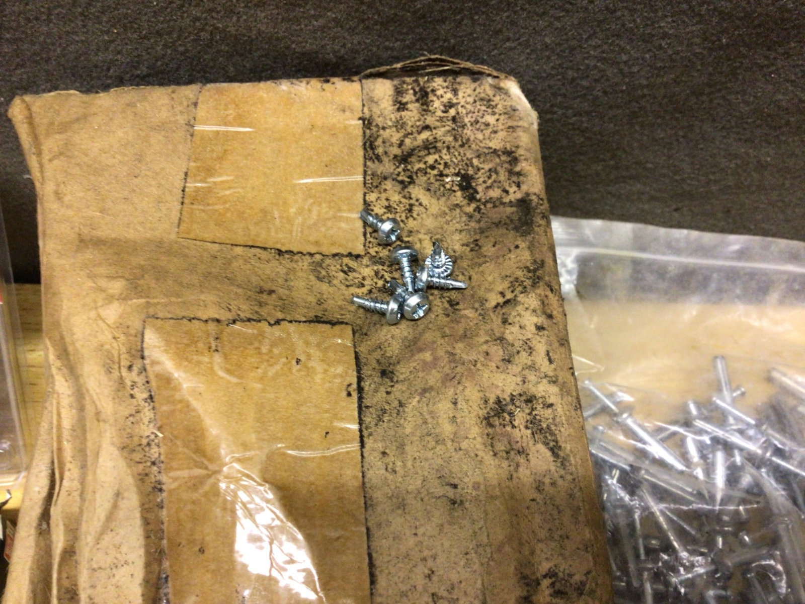 Hardware Lot Featuring Screws, Staples, Fasteners, and Electrical Components - 6