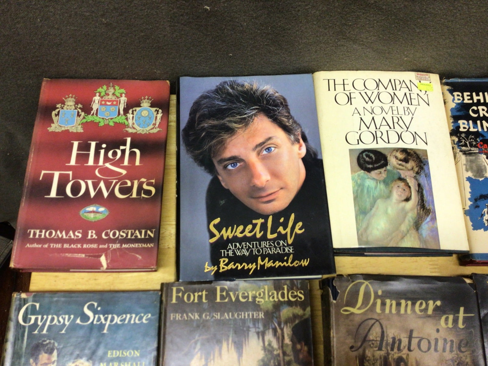 Hardback Books with Dust Jackets: This lot consists of several hardback books with dust jackets, primarily novels and historical literature. Titles include: 'High Towers' by Thomas B. Costain, 'Sweet Life' by Barry Manilow, 'The