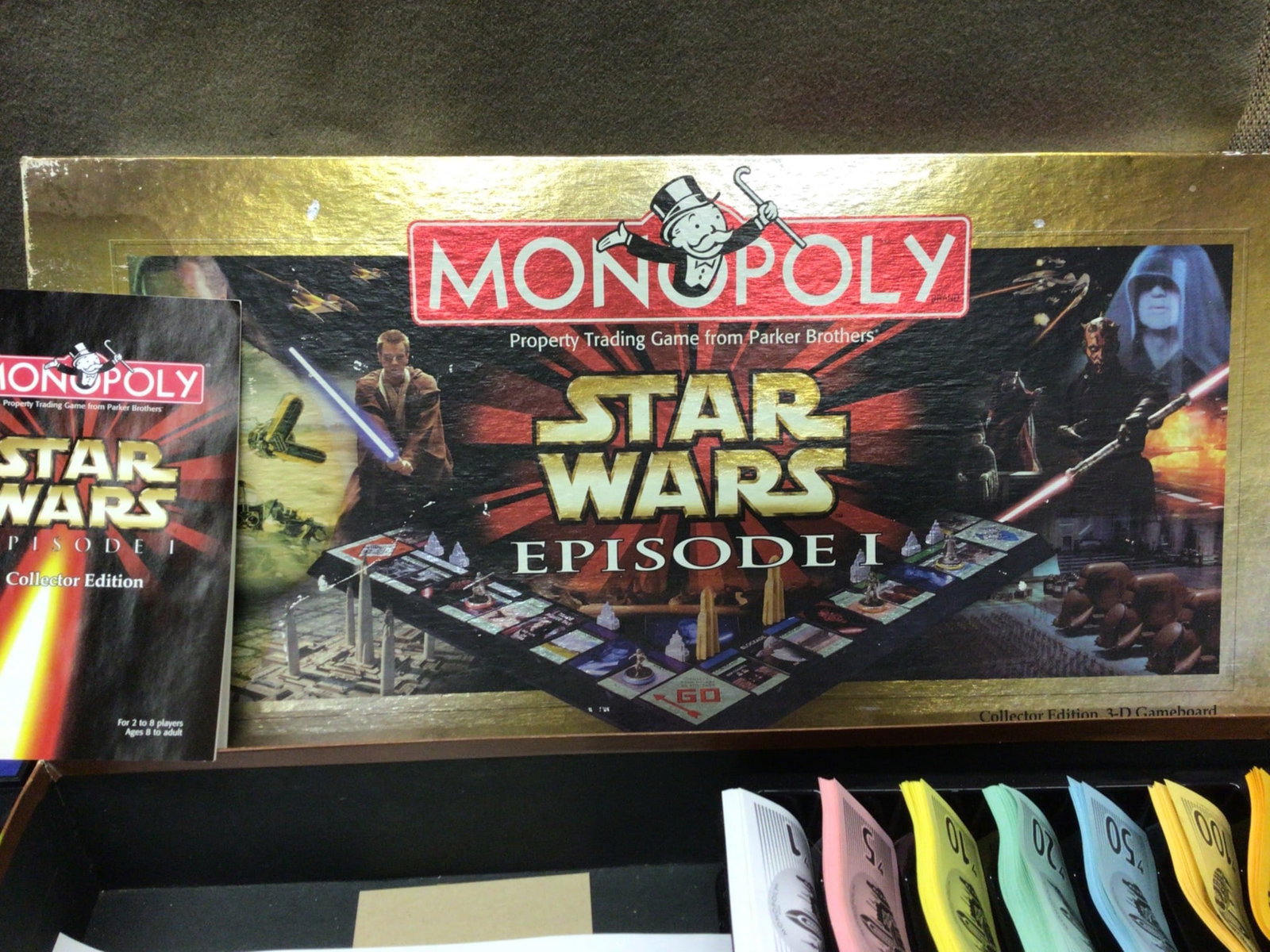 Monopoly Star Wars Episode I Collector's Edition, 100% Complete, Used Once: This lot features the Monopoly Star Wars Episode I Collector's Edition board game. The set is 100% complete and in excellent condition, used only once. It includes gameboard, character tokens, game