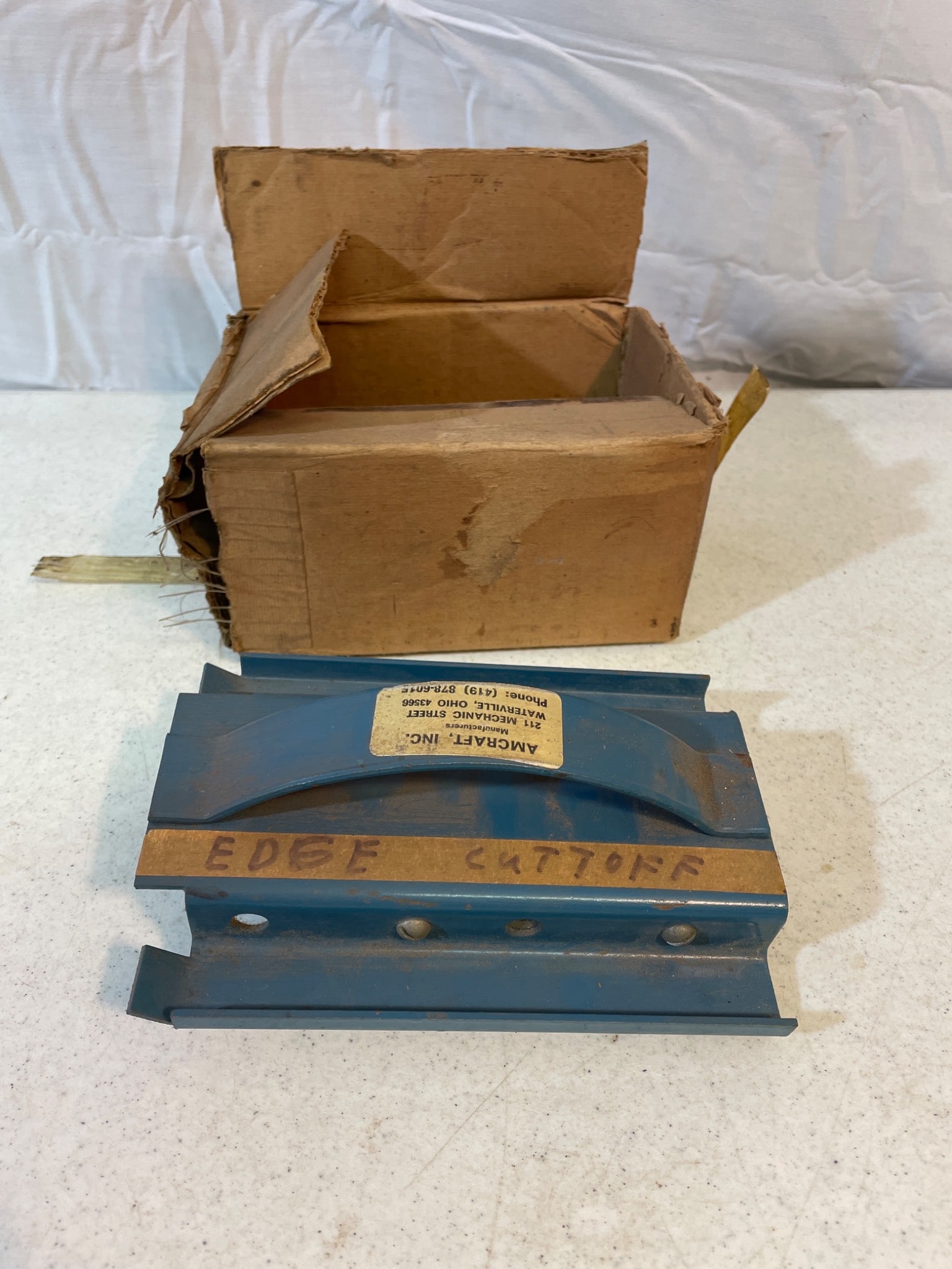 Blue Industrial Deburring or Cutting Tool with Blades and Original Box: This lot includes an industrial cutting or deburring tool finished in blue and featuring two metal blade sections. The tool comes housed in the original cardboard box, which shows signs of wear from