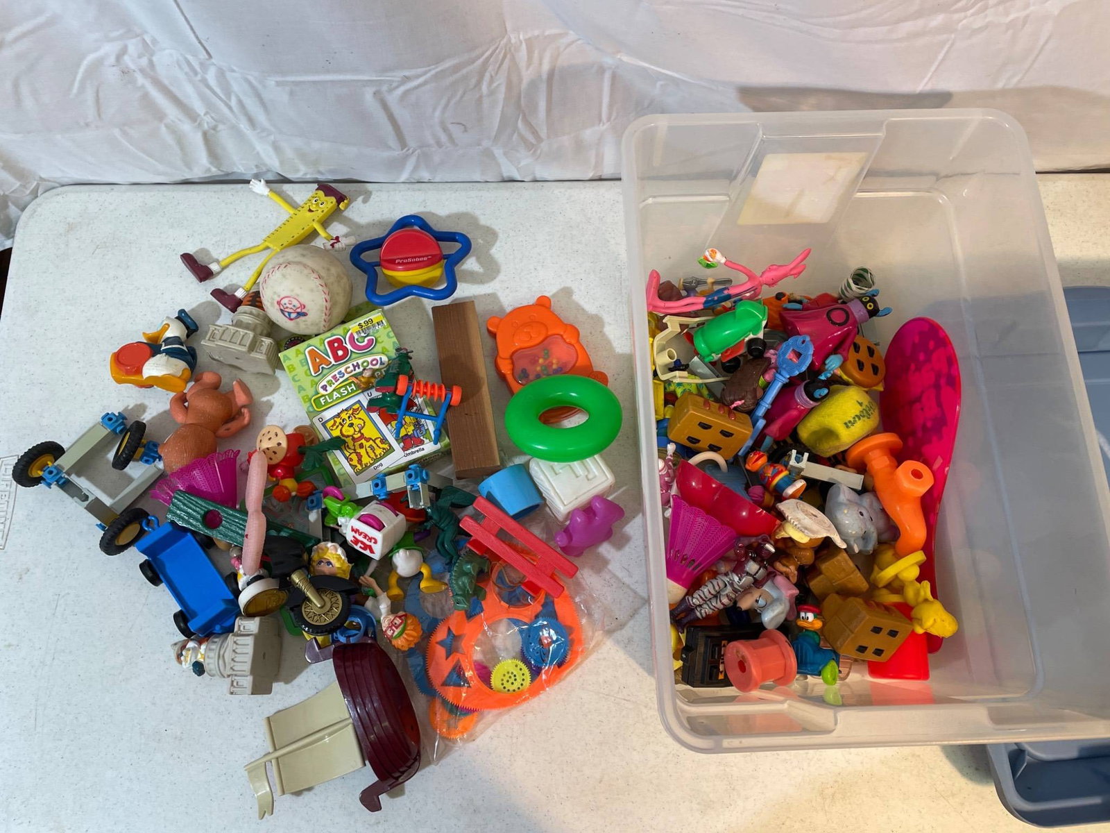 Plastic Toy Assortment With Figures, Accessories, and Loose Pieces (1 of 3)
