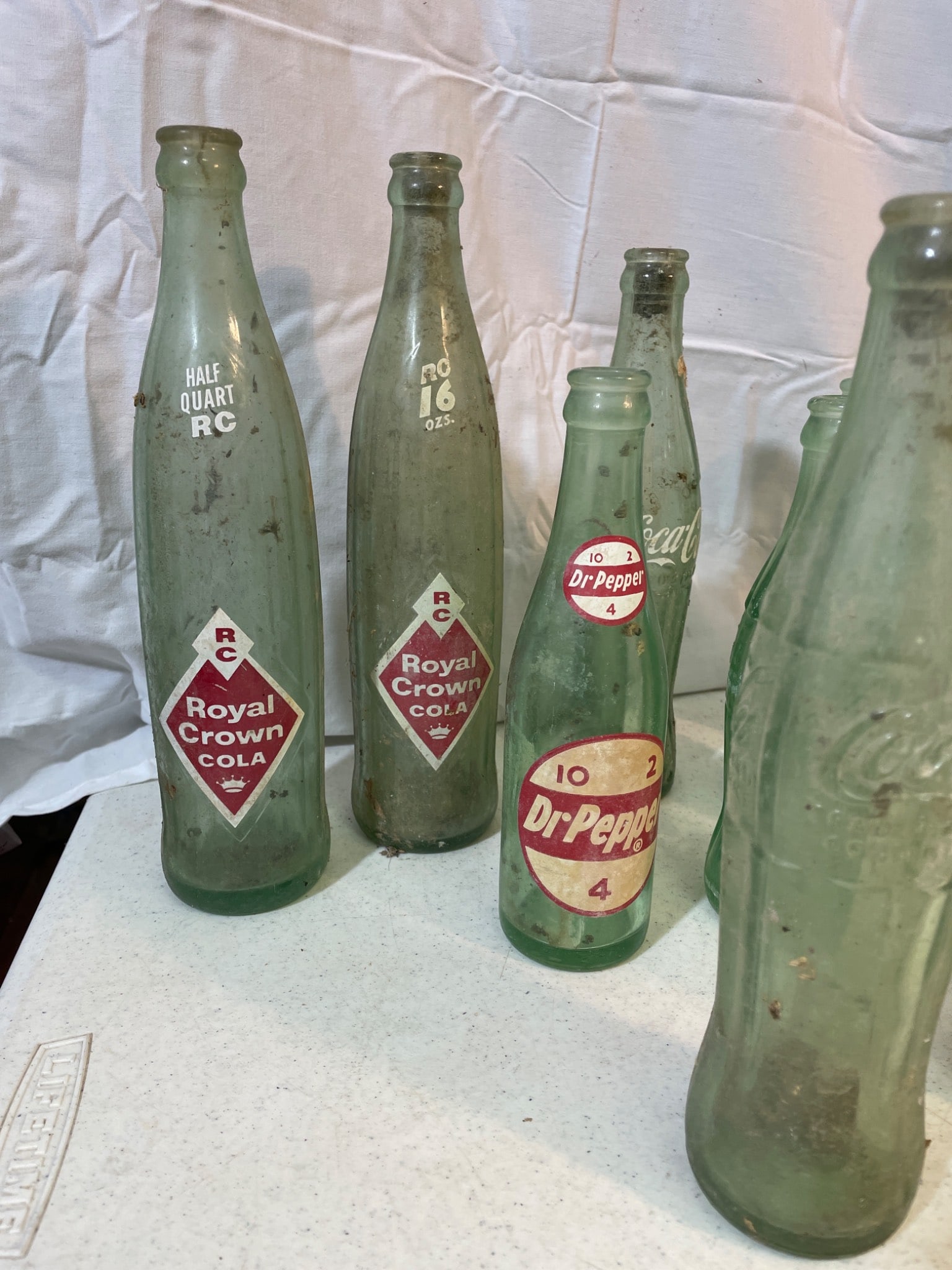 Vintage Soda Bottles Including Pepsi, Royal Crown, and Tru-Ade - 2