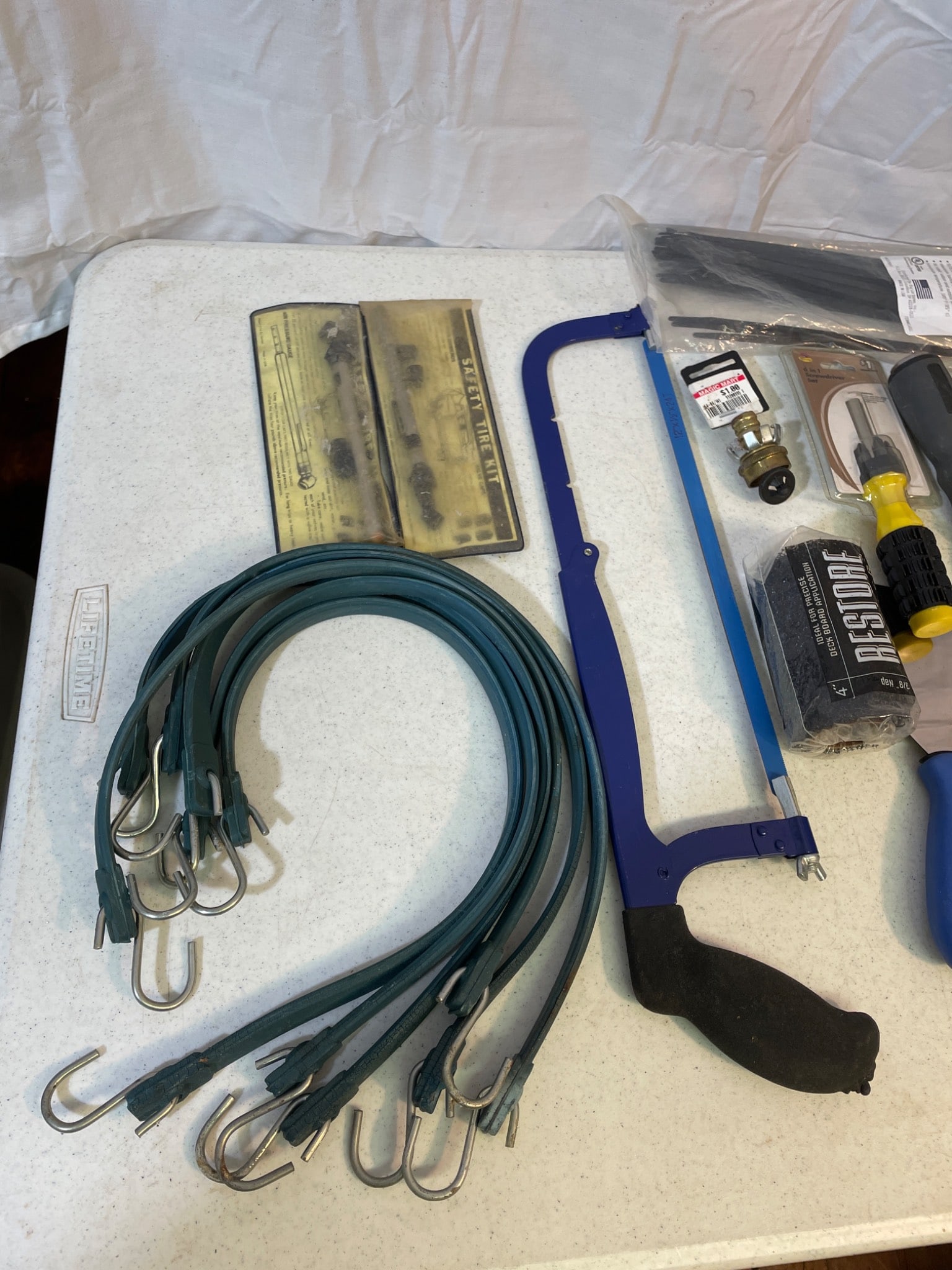 Hand Tools and Accessories Including Brushes, Saw, and Bungee Cords - 2