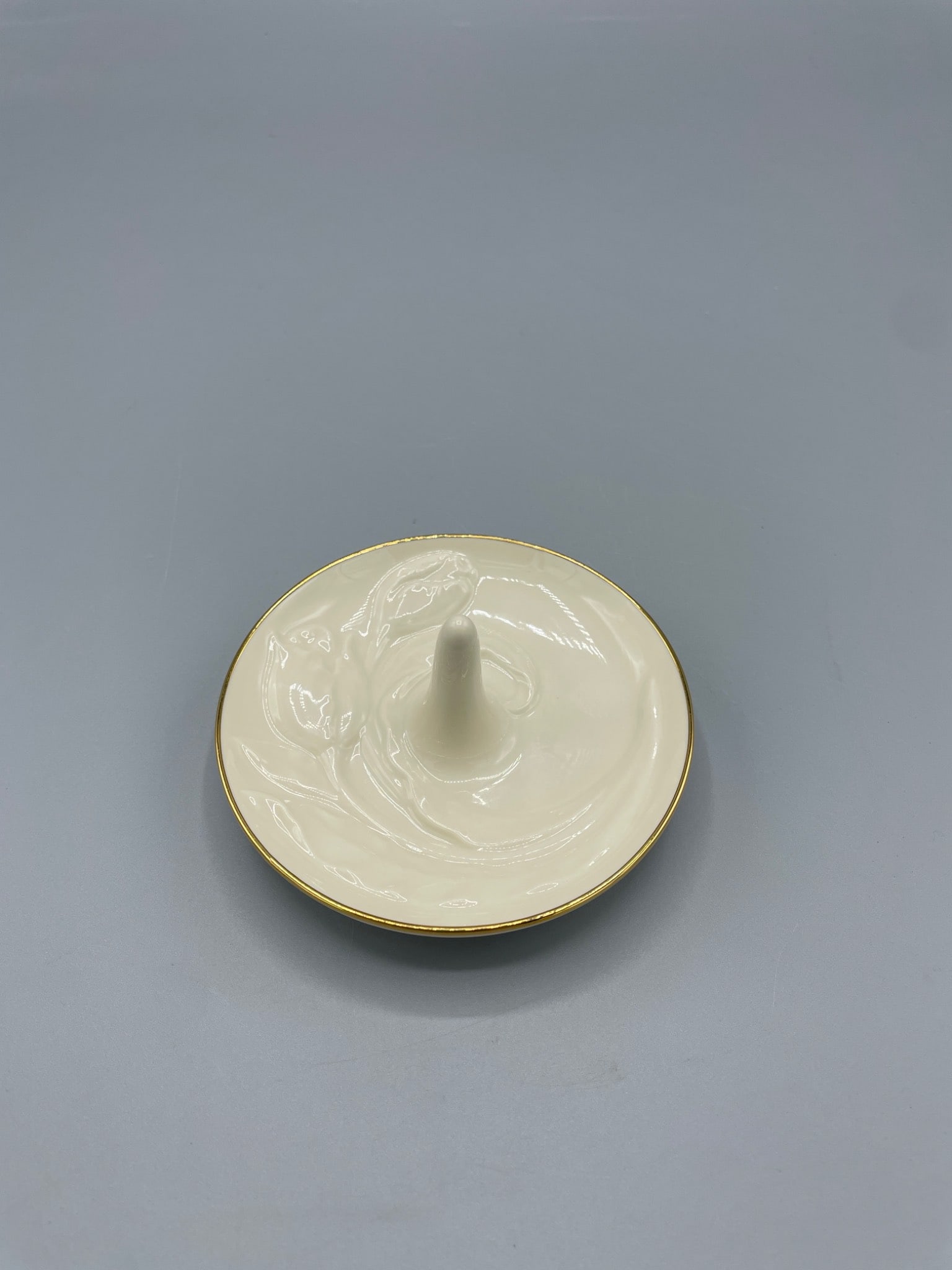 Lenox Tulip Ring Holder with Gold Trim, Model SKU #792519: This Lenox ring holder features a tulip design with gold trim on the edge. The model SKU is #792519, and it is marked 'Made in China' with the Lenox logo on the underside. The item is in ceramic