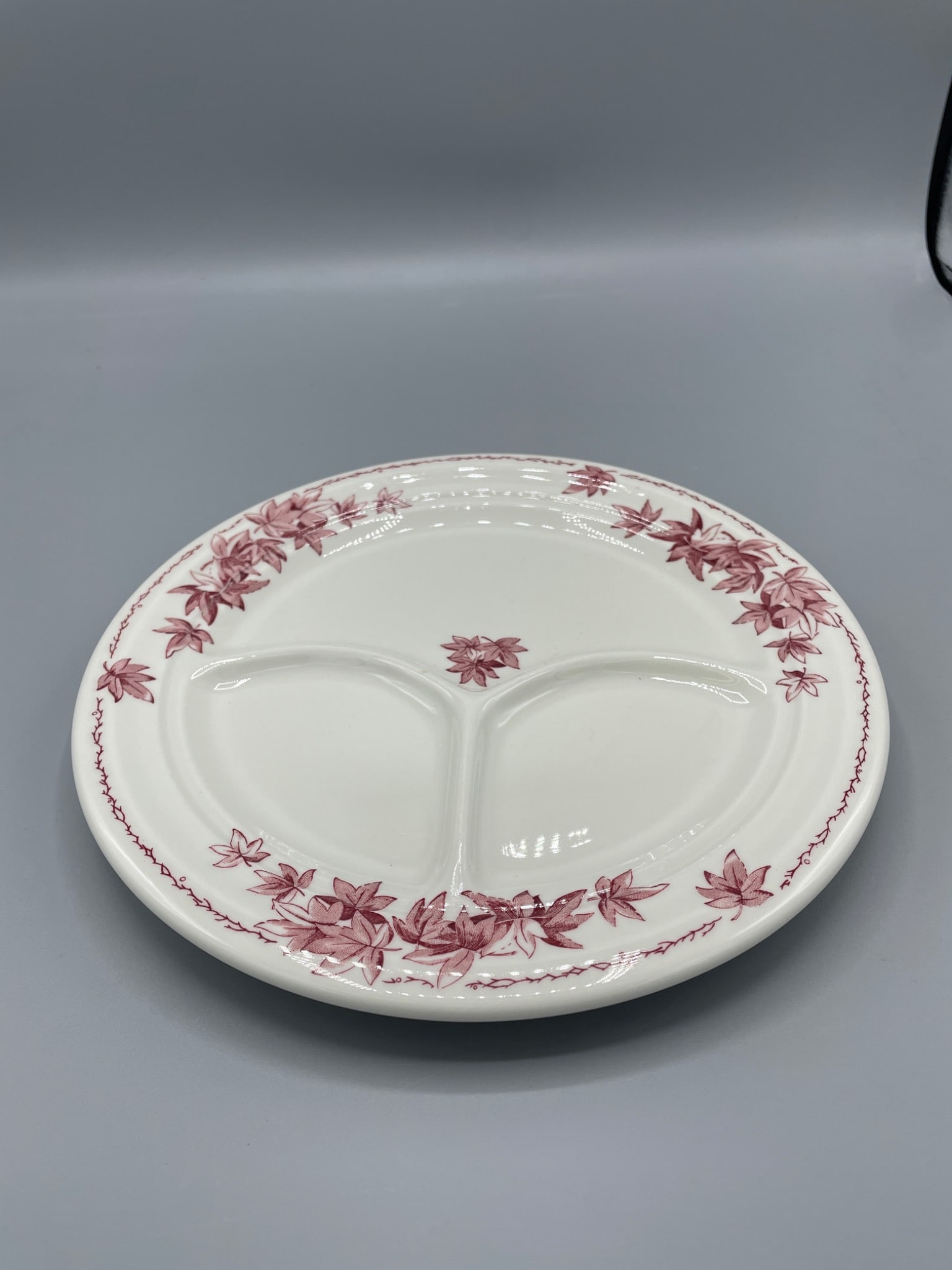 Shenango China RimRol WeiRoc Divided Plate, 8-14, Made in USA: This is a Shenango China divided plate featuring the RimRol WeiRoc design. Made in New Castle, PA, USA, the plate shows a red floral pattern around the rim and is divided into three sections. The mark