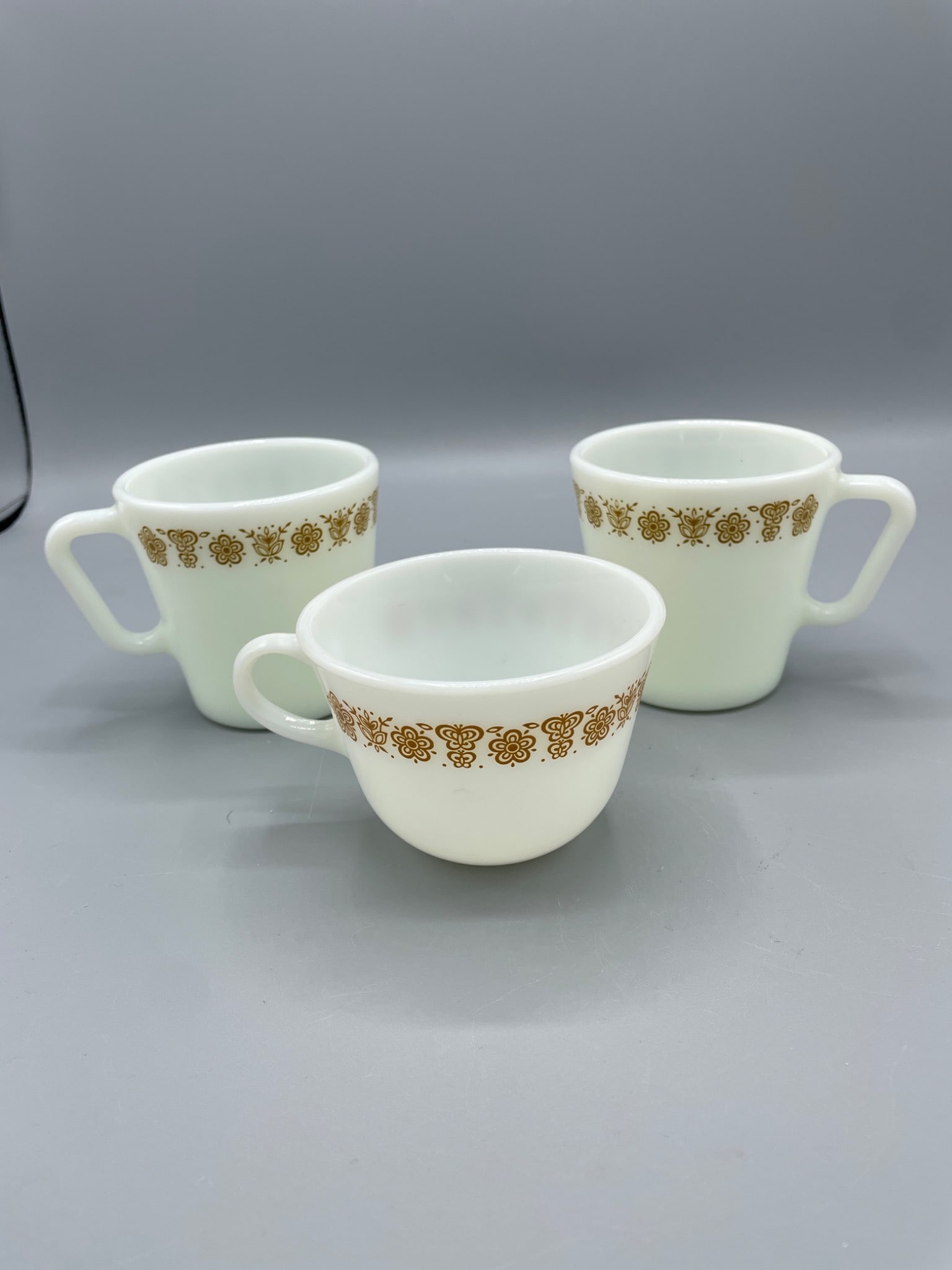 Three Pyrex USA Model No. 1410 and 702 Cups with Floral Design - 3