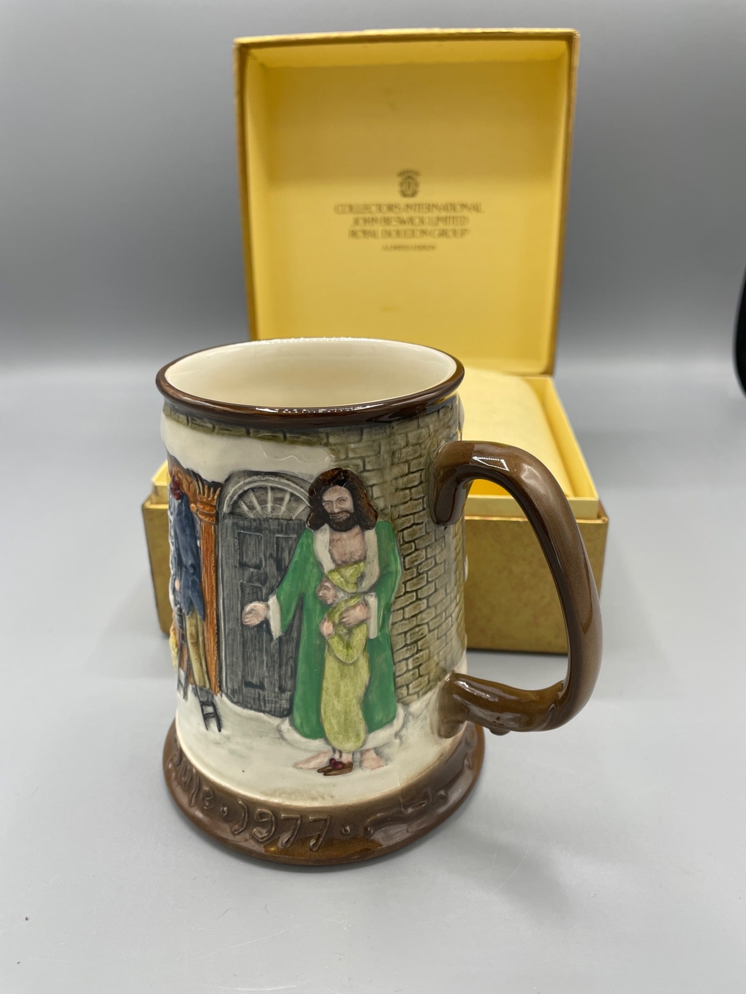 1977 Collectors International John Beswick Royal Doulton Group Mug, Limited Edition: This listing is for a 1977 limited edition ceramic mug by Collectors International, John Beswick Limited, under the Royal Doulton Group. The piece is hand-decorated and numbered 2077 out of an edition