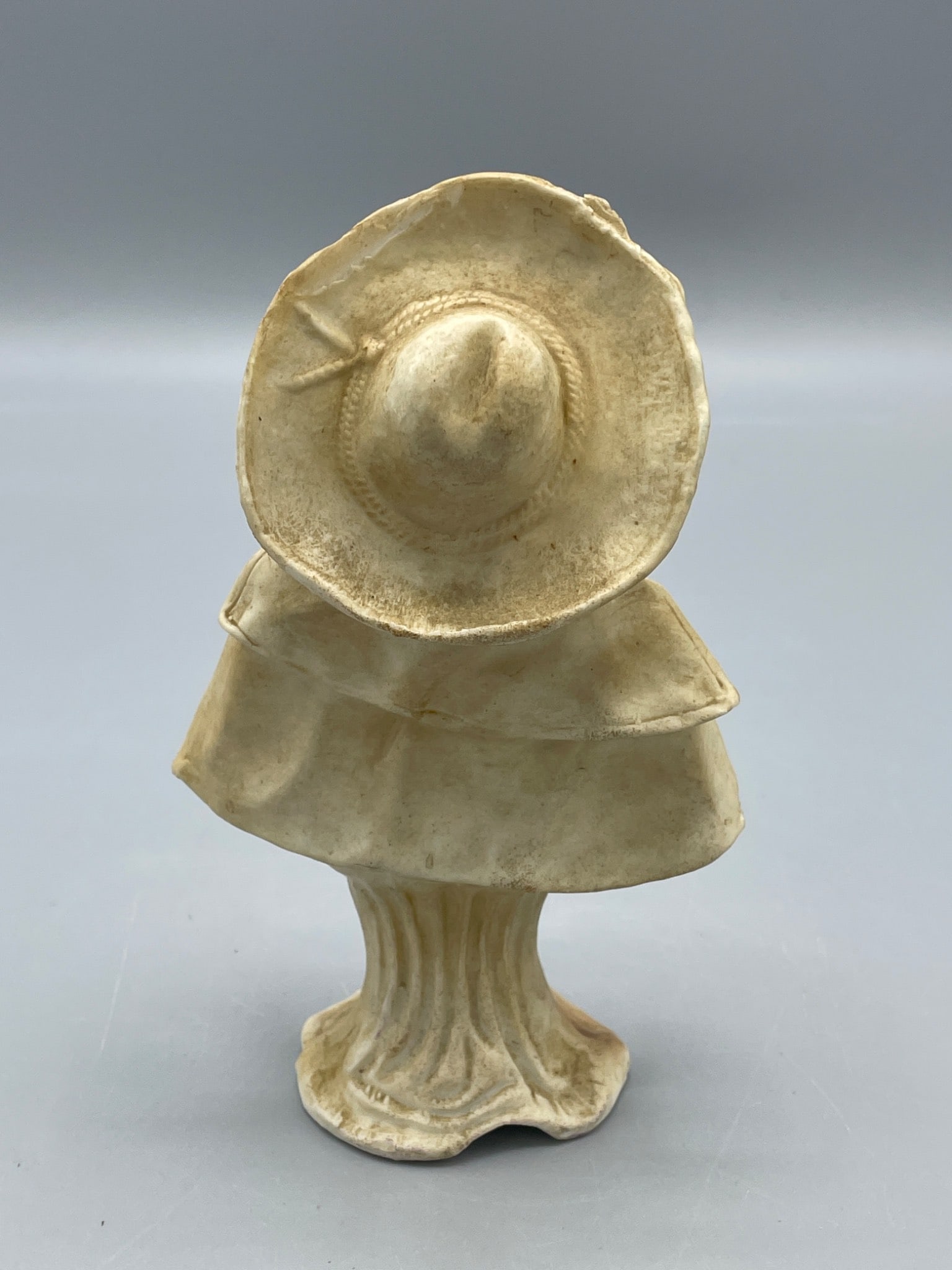 Porcelain Figurine of a Person Wearing Hat and Jacket on a Pedestal Base - 2