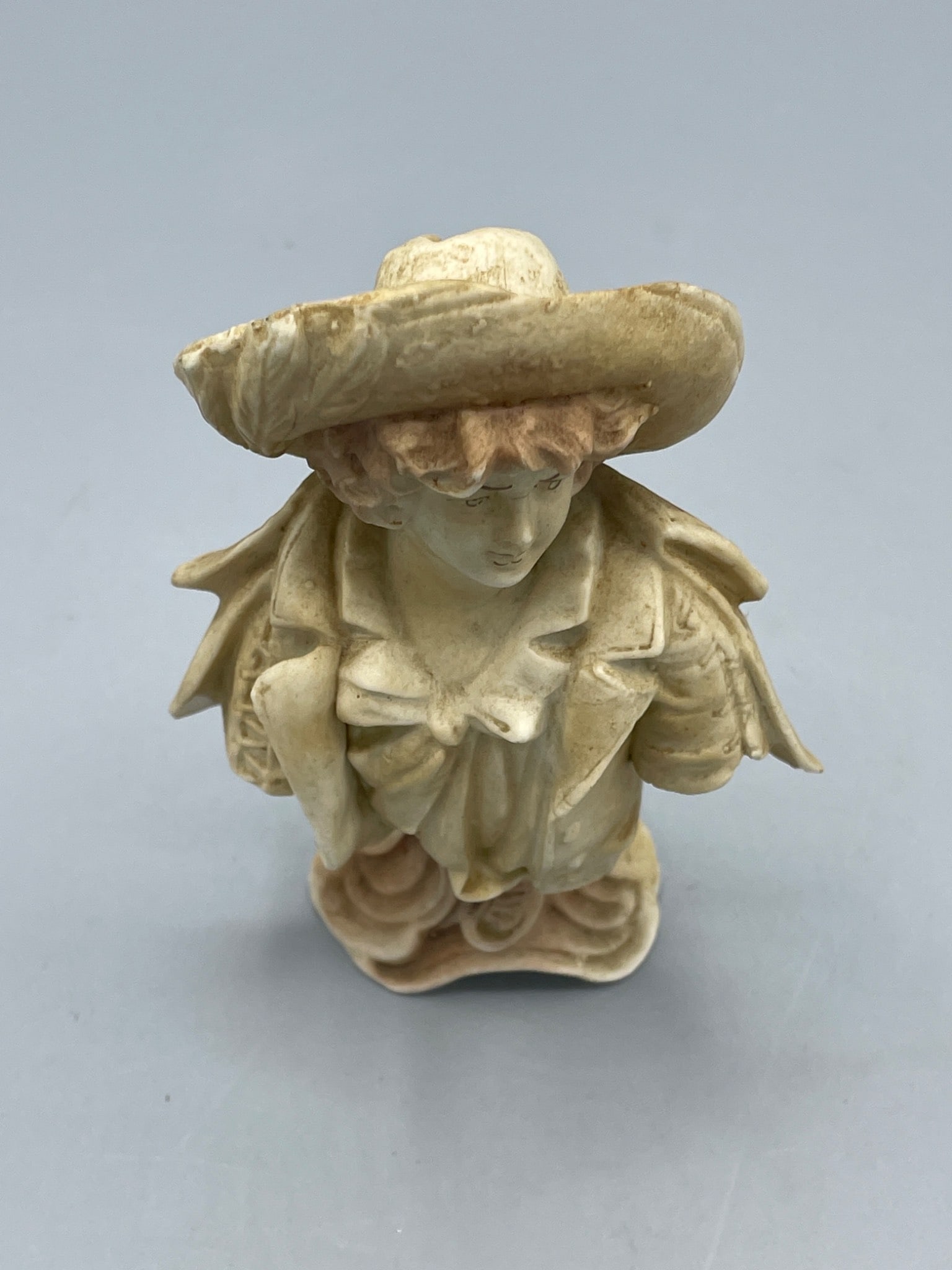 Porcelain Figurine of a Person Wearing Hat and Jacket on a Pedestal Base - 3