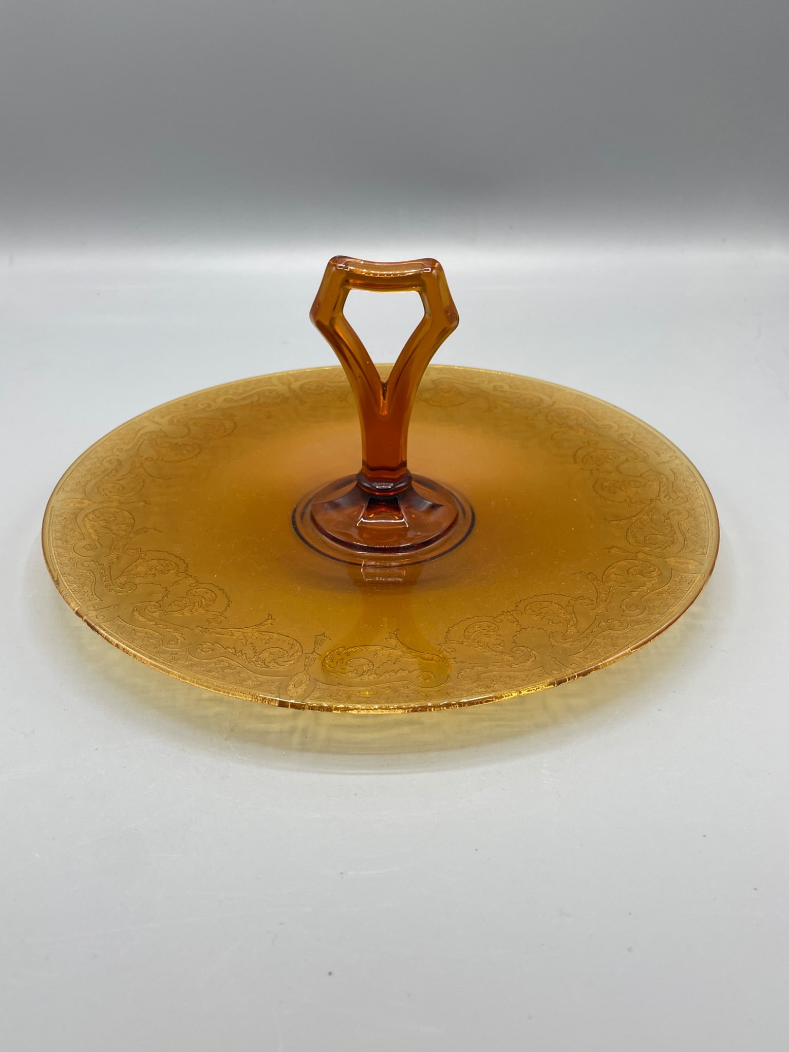 Amber Glass Serving Plate With Handle and Etched Floral Pattern Design (1 of 5)