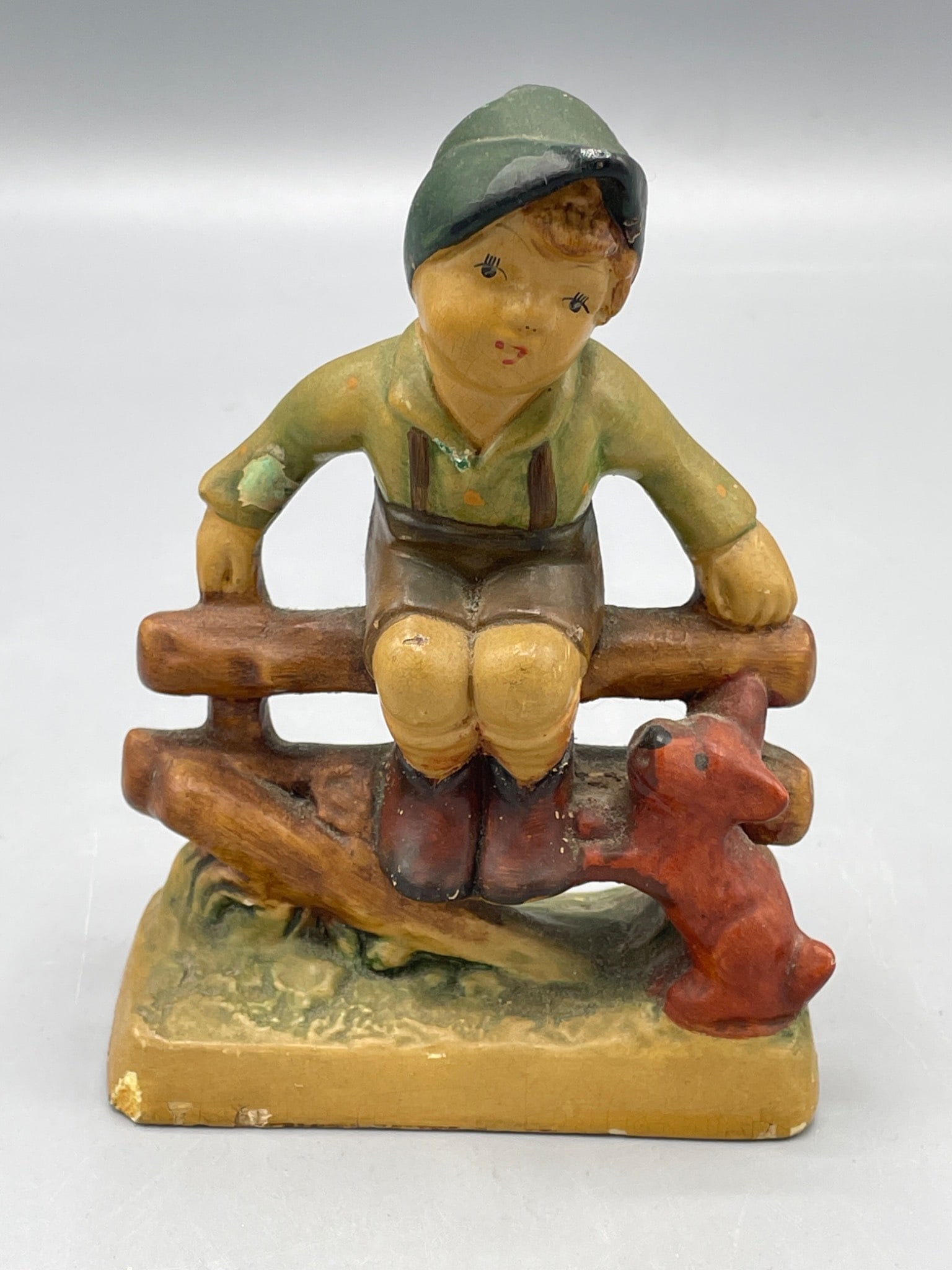 Hummel Hand-Painted Figurine Depicting Boy Sitting on Fence (1 of 5)