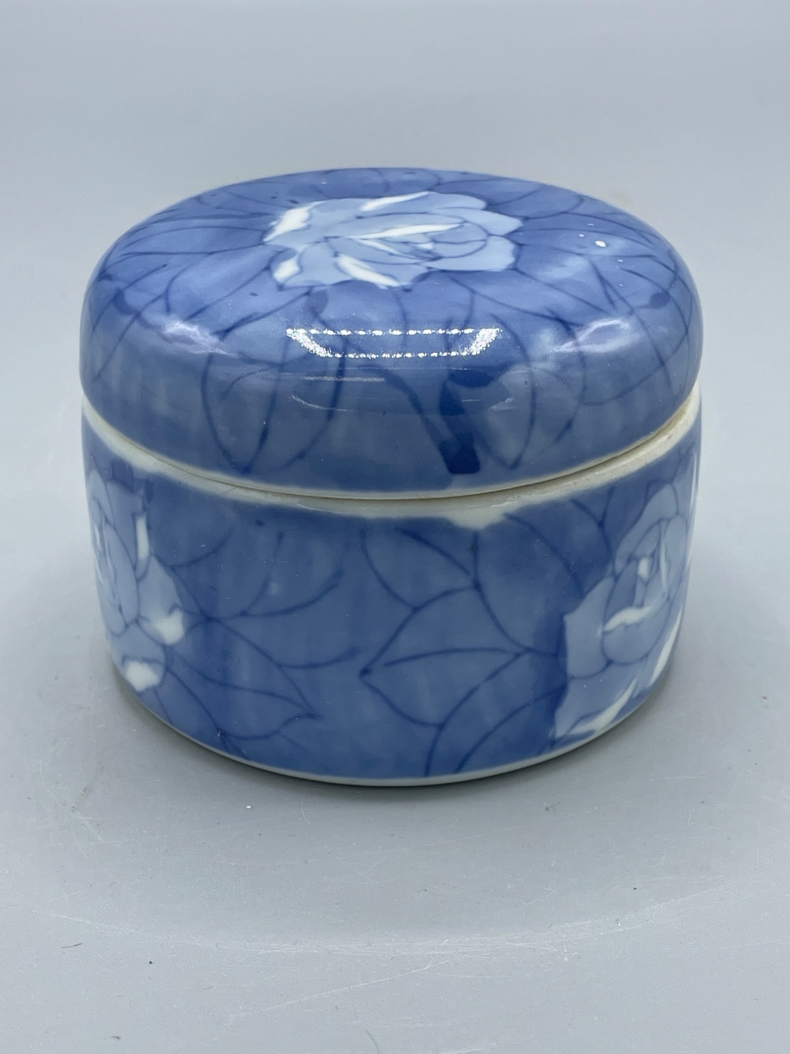 Blue And White Ceramic Lidded Jar with Floral Motif (1 of 5)