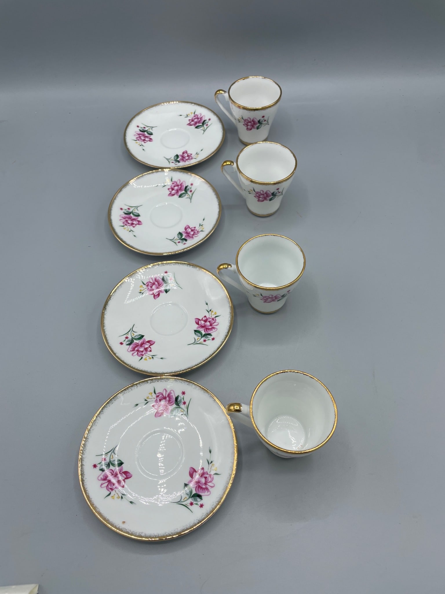 Four Porcelain Demitasse Cups and Saucers with Floral and Gold Trim - 2