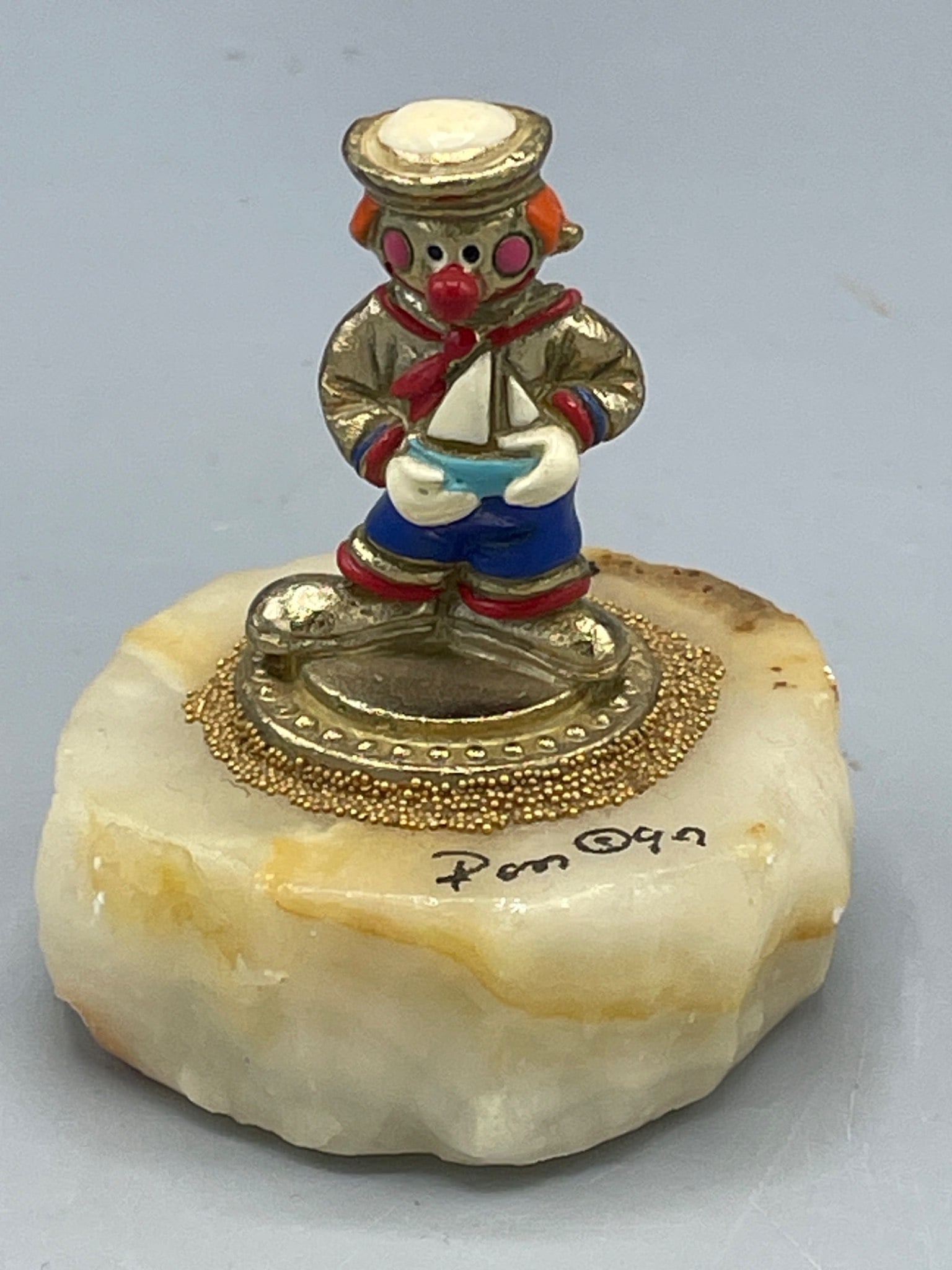 Ron Lee Hand-Painted Metal Clown Figurine Numbered And Signed: This is a hand-painted metal clown figurine by Ron Lee mounted on a polished stone base. The piece is artist-signed and numbered beneath the figure, indicating it is part of a limited edition series