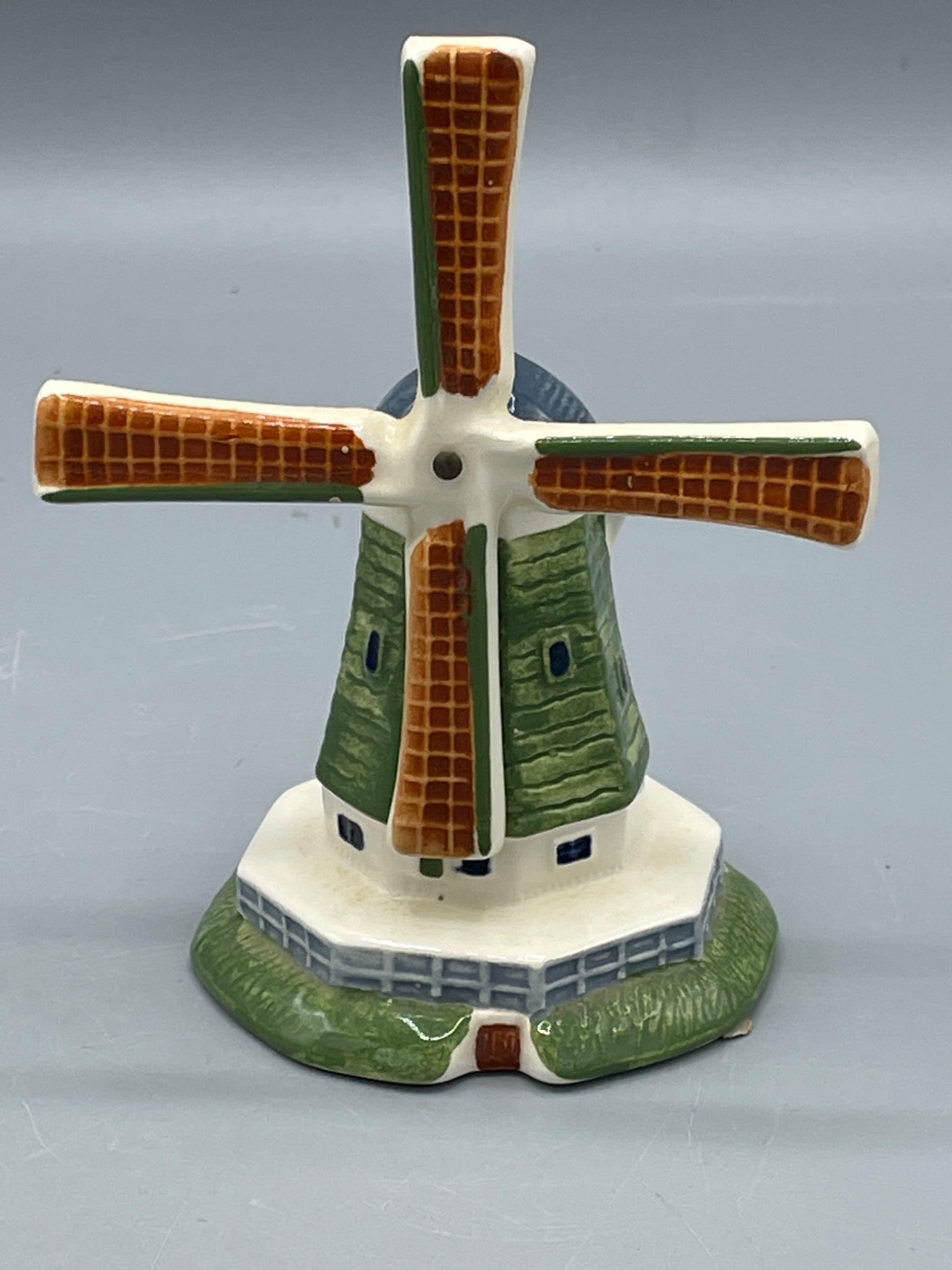 Royal Copenhagen 'Poly Delft' Ceramic Windmill, Model 1175O: A hand-painted ceramic windmill figurine marked 'Poly Delft,' produced by Royal Copenhagen, Denmark. Base is stamped with the Royal Copenhagen hallmark, 'Hand Painted,' and model number 1175O. Height