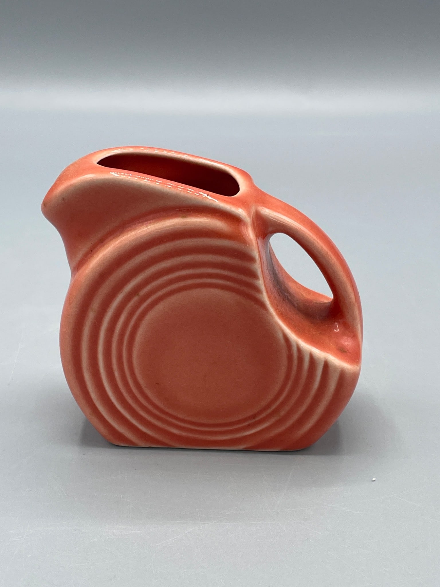 Fiesta Disk Water Pitcher in Red with Circular Pattern, Made by Homer Laughlin China Co. (1 of 5)
