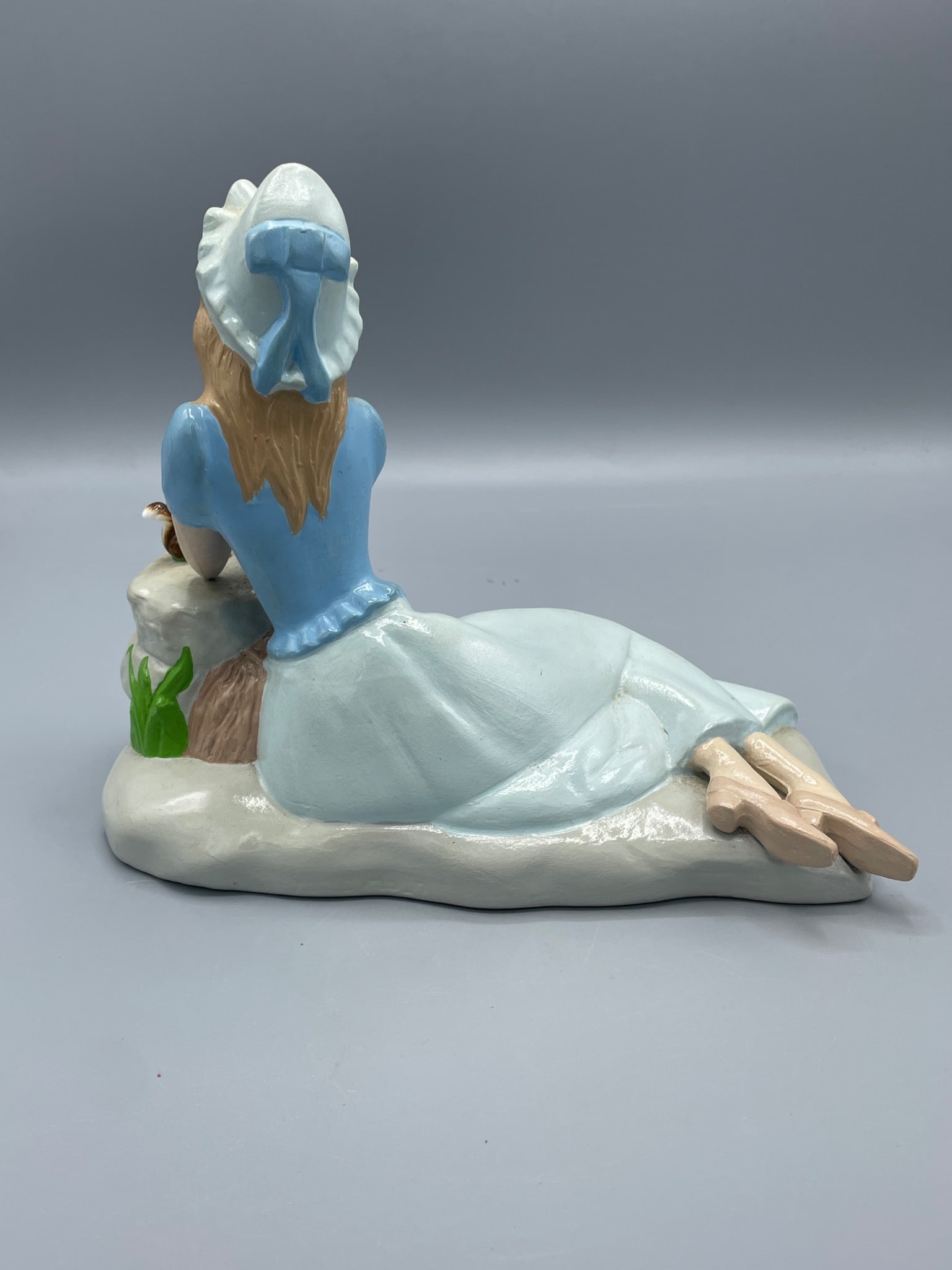 Hand-Painted Ceramic Figurine of Woman With Bonnet and Cat on Rock Formation - 3