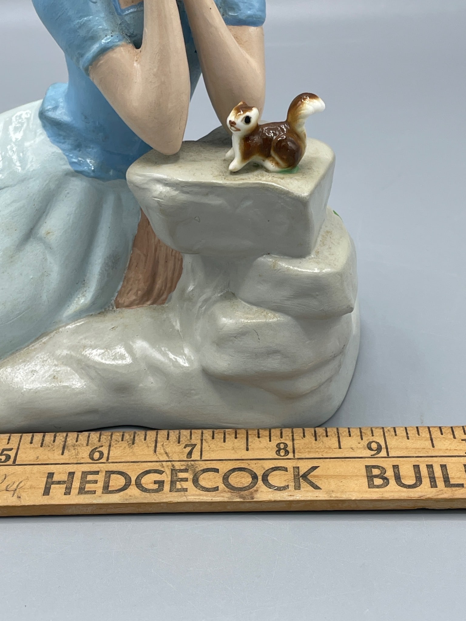 Hand-Painted Ceramic Figurine of Woman With Bonnet and Cat on Rock Formation - 7