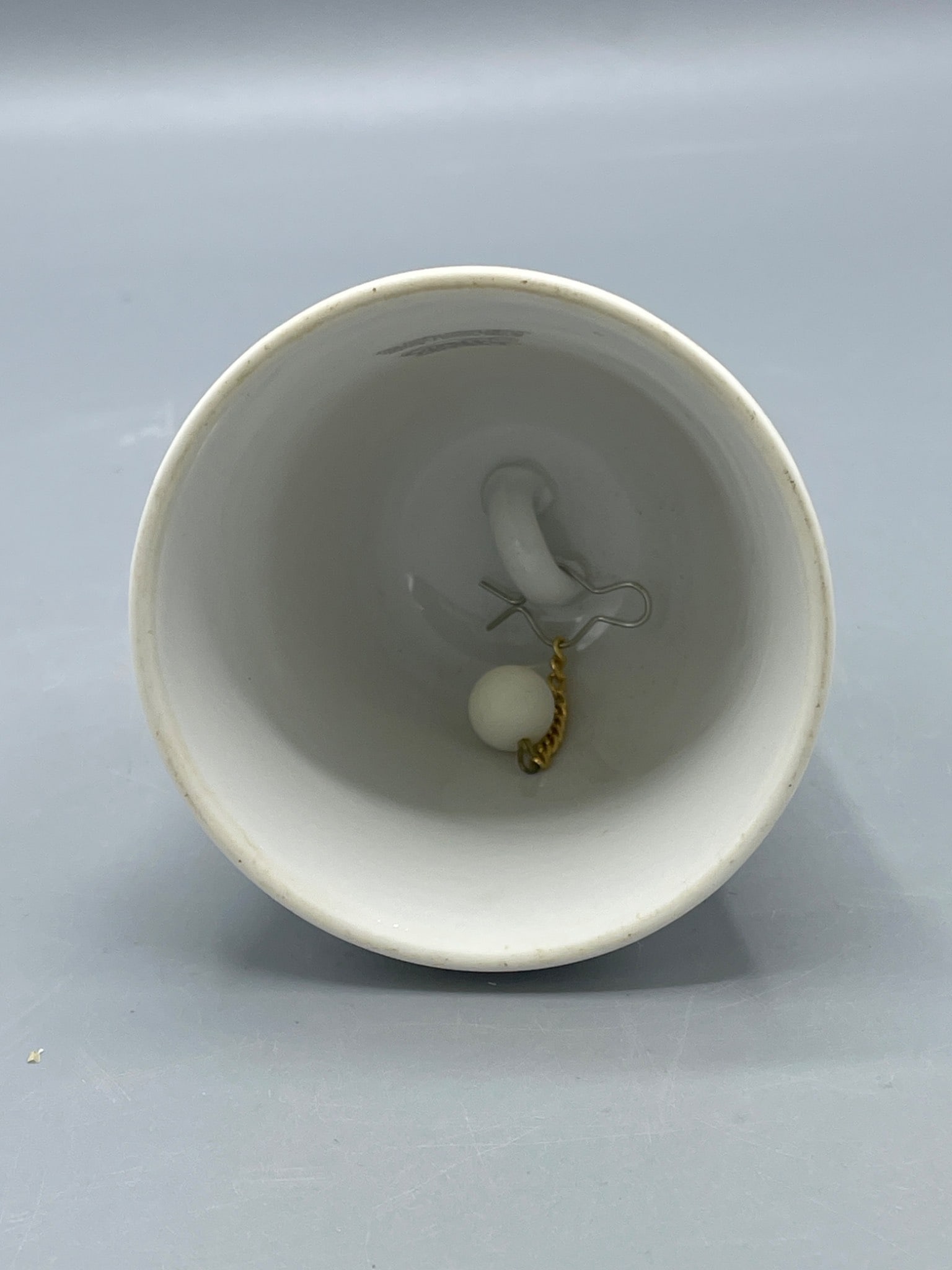 Porcelain Bell with Cross Handle and Figurative Artwork, Approx. 6 Inches High - 4