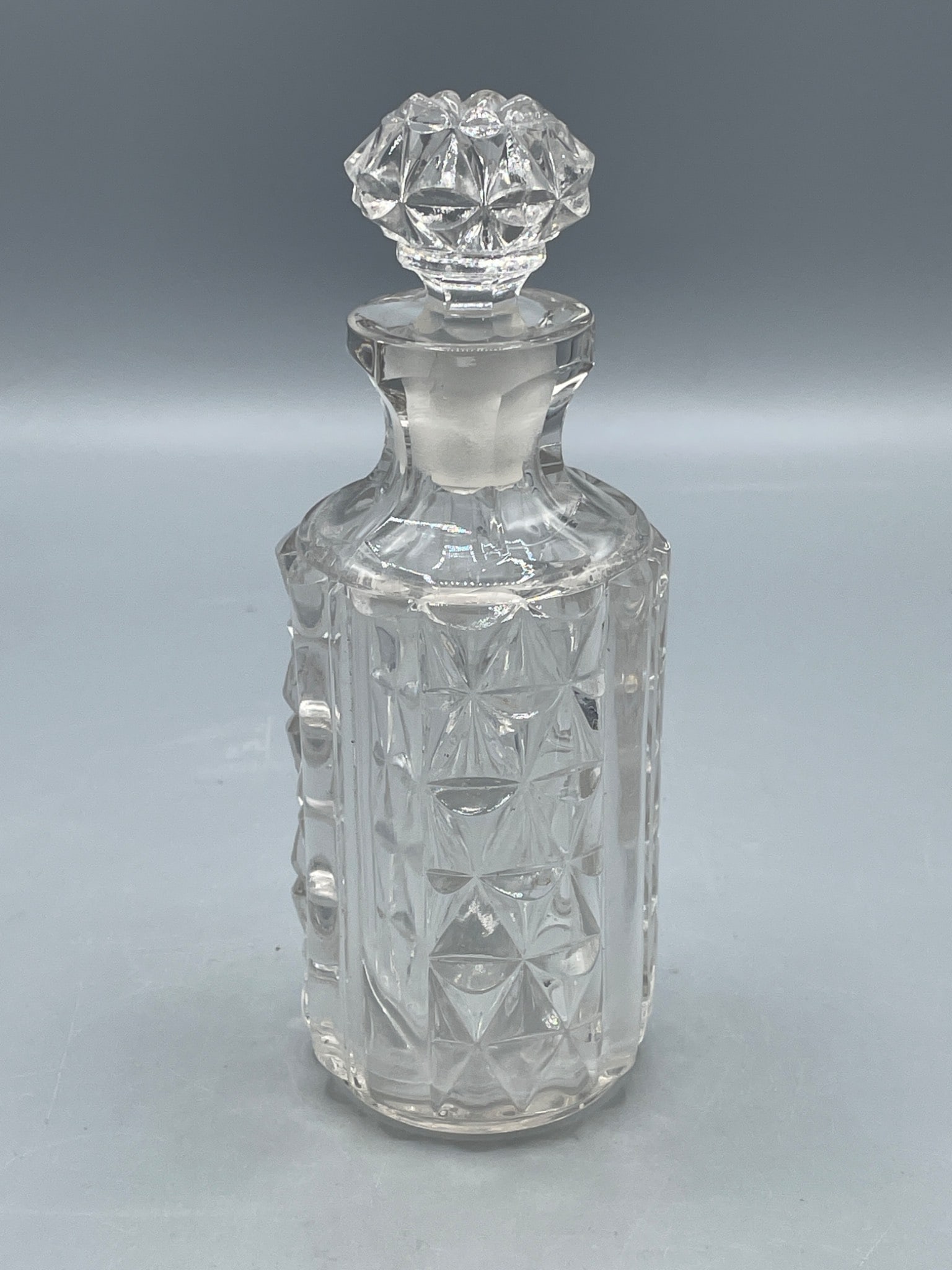 Clear Glass Decanter With Stopper Featuring Geometric Pattern Design (1 of 5)