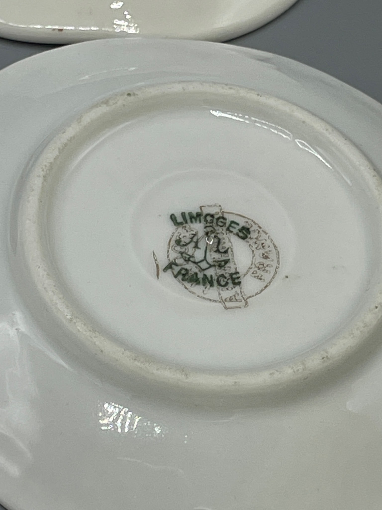 Nine Porcelain Saucers with Mixed Marks Including Limoges and KPF - 11
