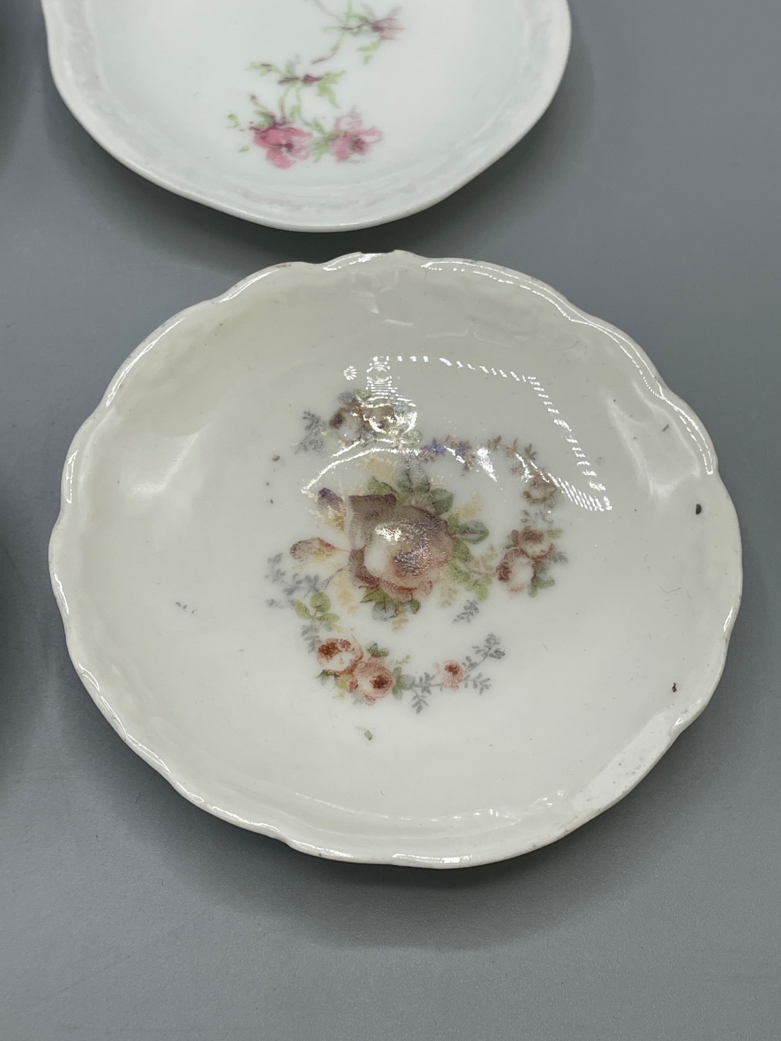 Nine Porcelain Saucers with Mixed Marks Including Limoges and KPF - 2