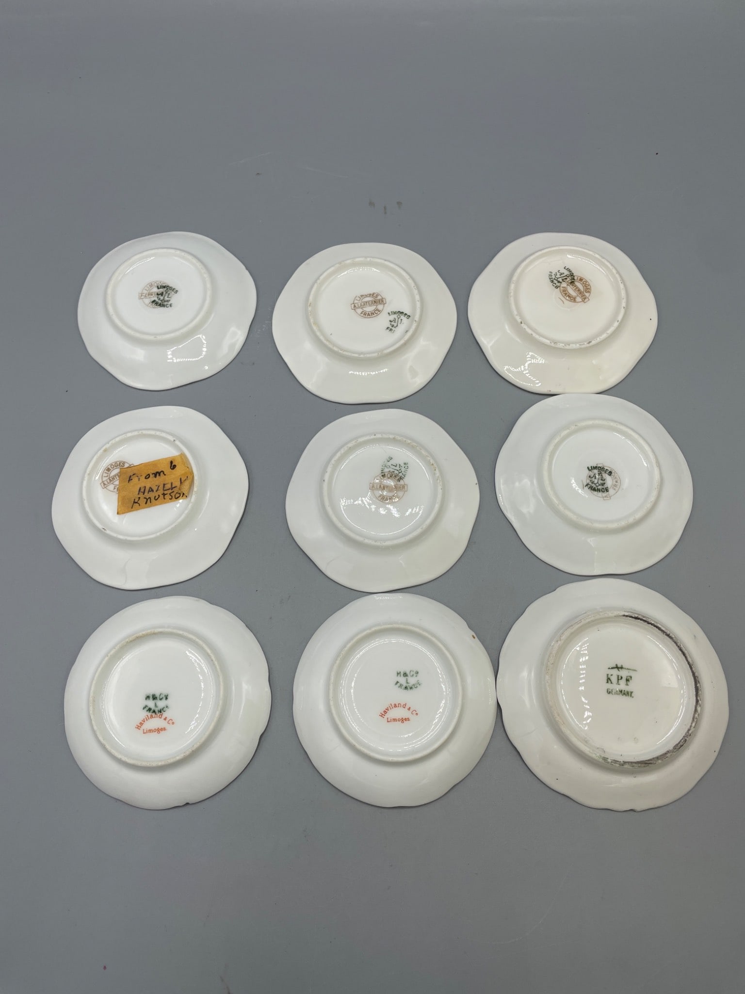 Nine Porcelain Saucers with Mixed Marks Including Limoges and KPF - 5