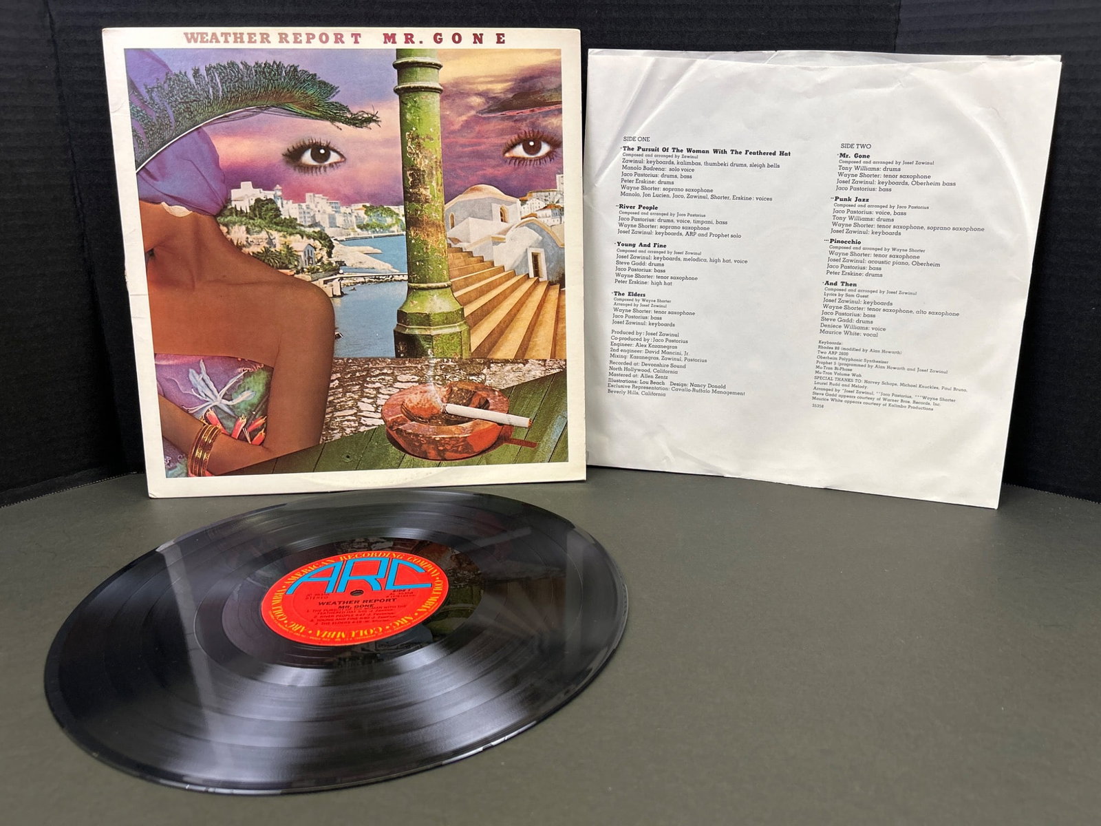Weather Report 'Mr. Gone' Vinyl LP, Original Pressing with Sleeve: Weather Report's 'Mr. Gone' vinyl LP. Original pressing featuring the iconic jazz fusion album released in 1978 under ARC/Columbia Records. Includes original jacket and inner sleeve with printed lyric