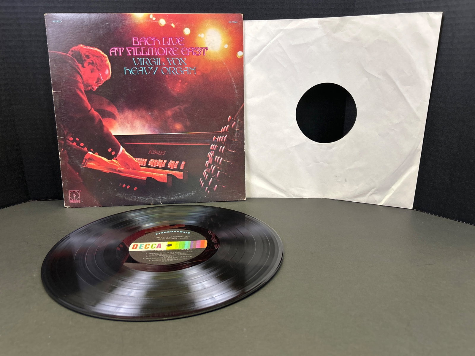 Bach Live At Fillmore East Vinyl Record by Virgil Fox, Decca DL75266: This is the vinyl record album 'Bach Live At Fillmore East,' performed by Virgil Fox on the organ. The record is issued by Decca Records with the catalog number DL75266. The album includes live