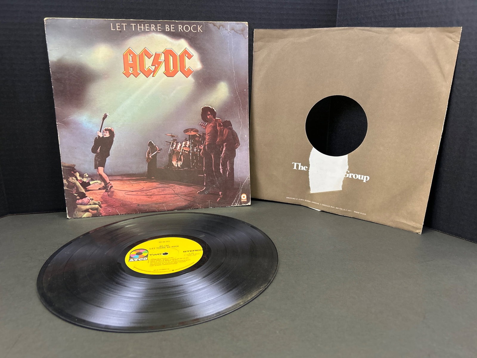 AC/DC â€˜Let There Be Rockâ€™ Vinyl LP, Atlantic Label, 1977 Releas: AC/DC â€˜Let There Be Rockâ€™ vinyl LP, released in 1977 under the Atlantic Records label (SD 36-151). Includes original outer sleeve with cover art and plain inner