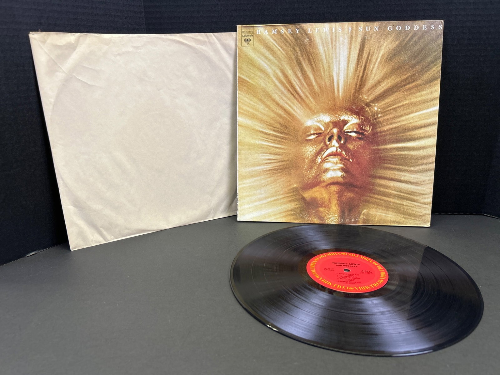 Herbie Hancock â€“ Sun Goddess LP Vinyl Record with Gatefold Sleeve: Herbie Hancockâ€™s LP Vinyl Record for â€˜Sun Goddess.â€™ Released under Columbia Records. Includes original gatefold sleeve and inner white