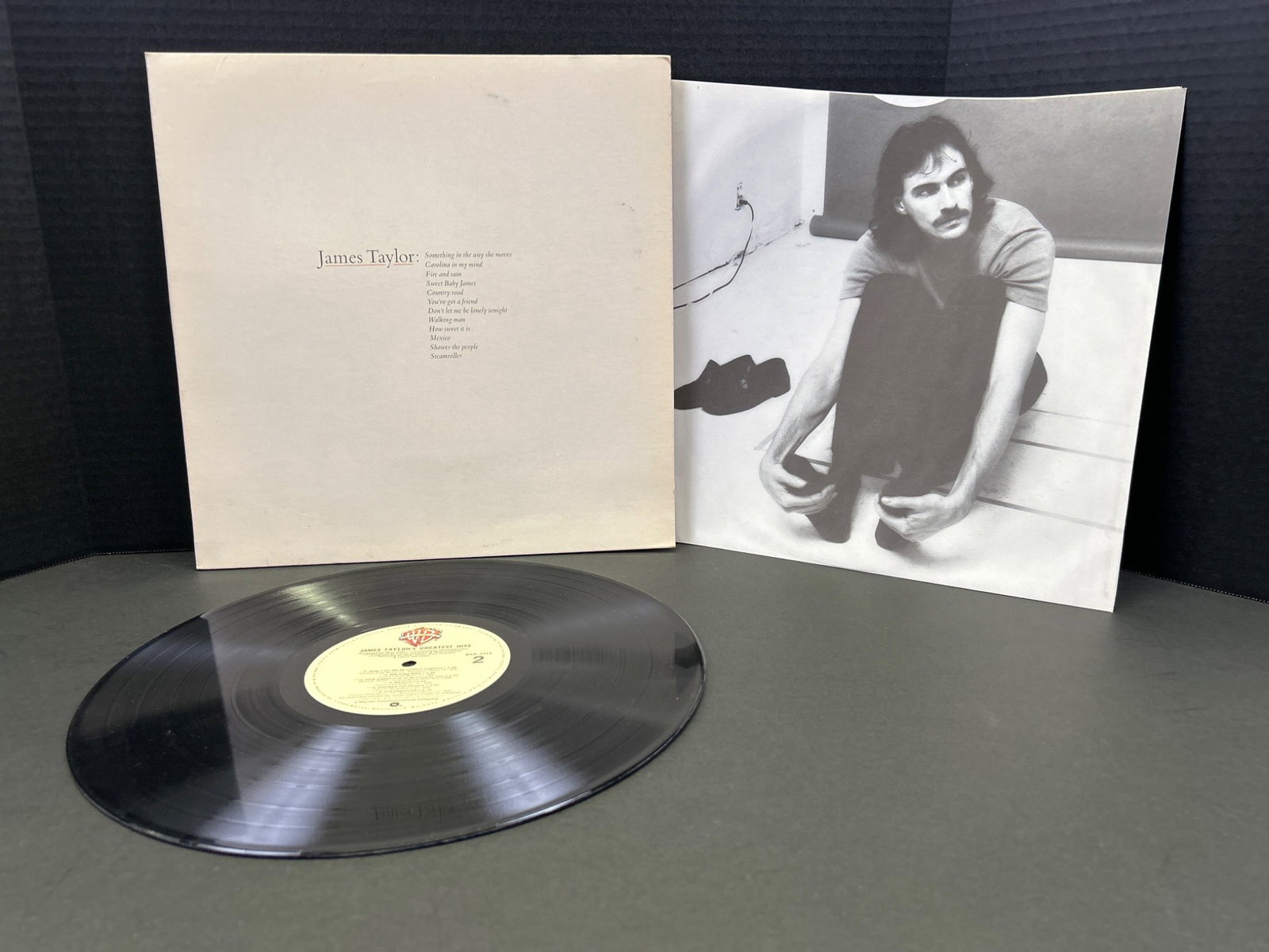 James Taylor Self-Titled Vinyl Record, Released by Apple Records, 1968: Self-titled James Taylor vinyl album released in 1968 under Apple Records, catalog number SKAO-3352. Includes original vinyl, inner sleeve, and outer cover. The vinyl shows minor handling wear but is 