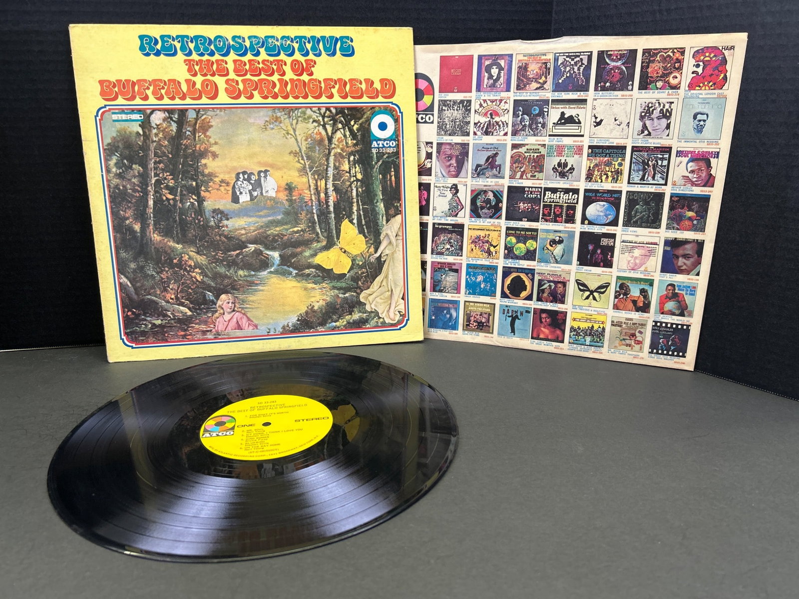 Retrospective: The Best of Buffalo Springfield Vinyl Record, ATCO SD 33-283: This lot features the vinyl record 'Retrospective: The Best of Buffalo Springfield,' under the ATCO Records label, catalog number SD 33-283. It includes the outer sleeve and an inner sleeve