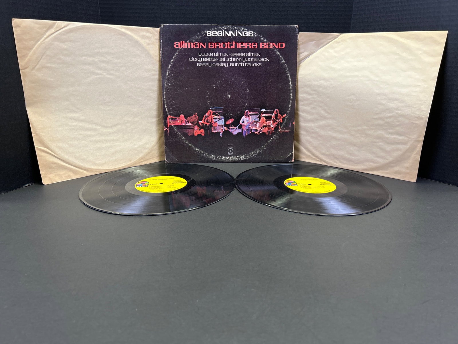 Allman Brothers Band 'Beginnings' LP Record Set (Capricorn 2CX 0132, 1973): This lot includes a 2-LP record set of 'Beginnings' by the Allman Brothers Band, released under the Capricorn Records label in 1973 (Catalog No. 2CX 0132). The records feature classic tracks by the
