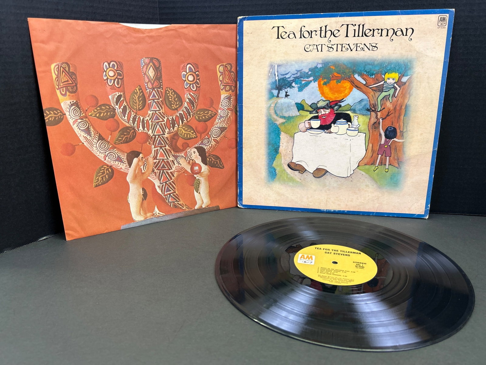 Cat Stevens â€˜Tea for the Tillermanâ€™ Vinyl LP Album with Jacket : This listing features the Cat Stevens album â€˜Tea for the Tillermanâ€™ in vinyl LP format. The record includes the original outer jacket and sleeve with album
