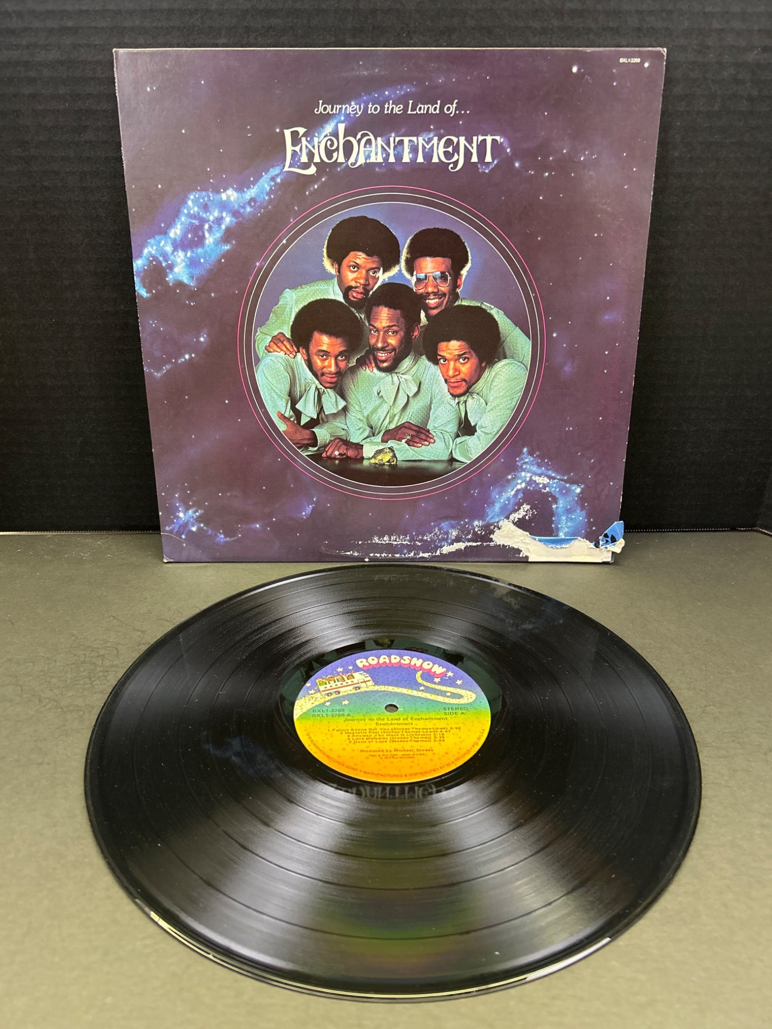 Journey to the Land of... Enchantment Vinyl Album, 1979: Vinyl record titled 'Journey to the Land of... Enchantment' by Enchantment, released in 1979 under the Roadshow Records label (catalog number RS41002). Includes original outer sleeve with noticeable