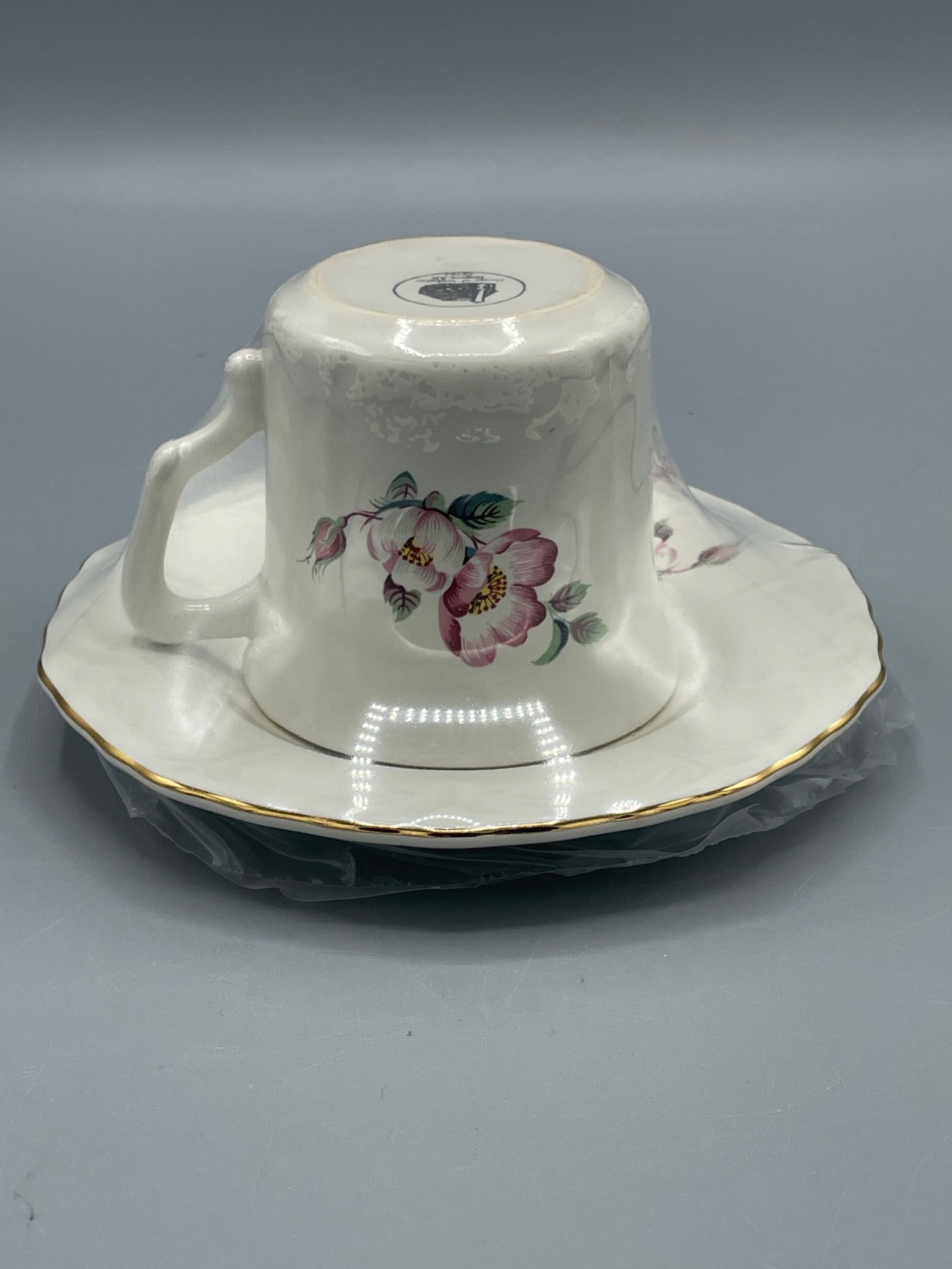 Porcelain Teacup and Saucer Set with Floral Design and Maker's Mark - 2