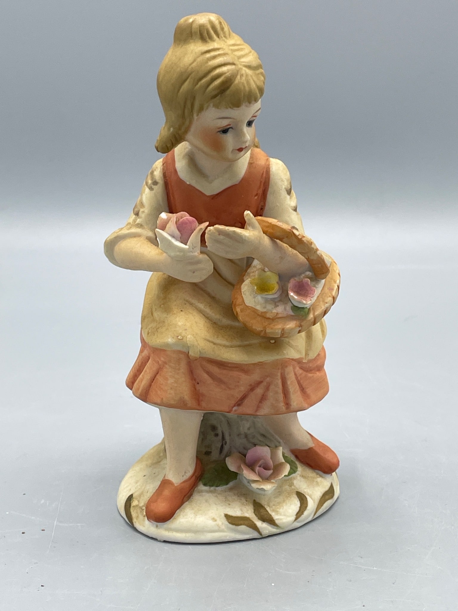 Hand-Painted Ceramic Figurine of Girl Holding Basket With Flowers - 4