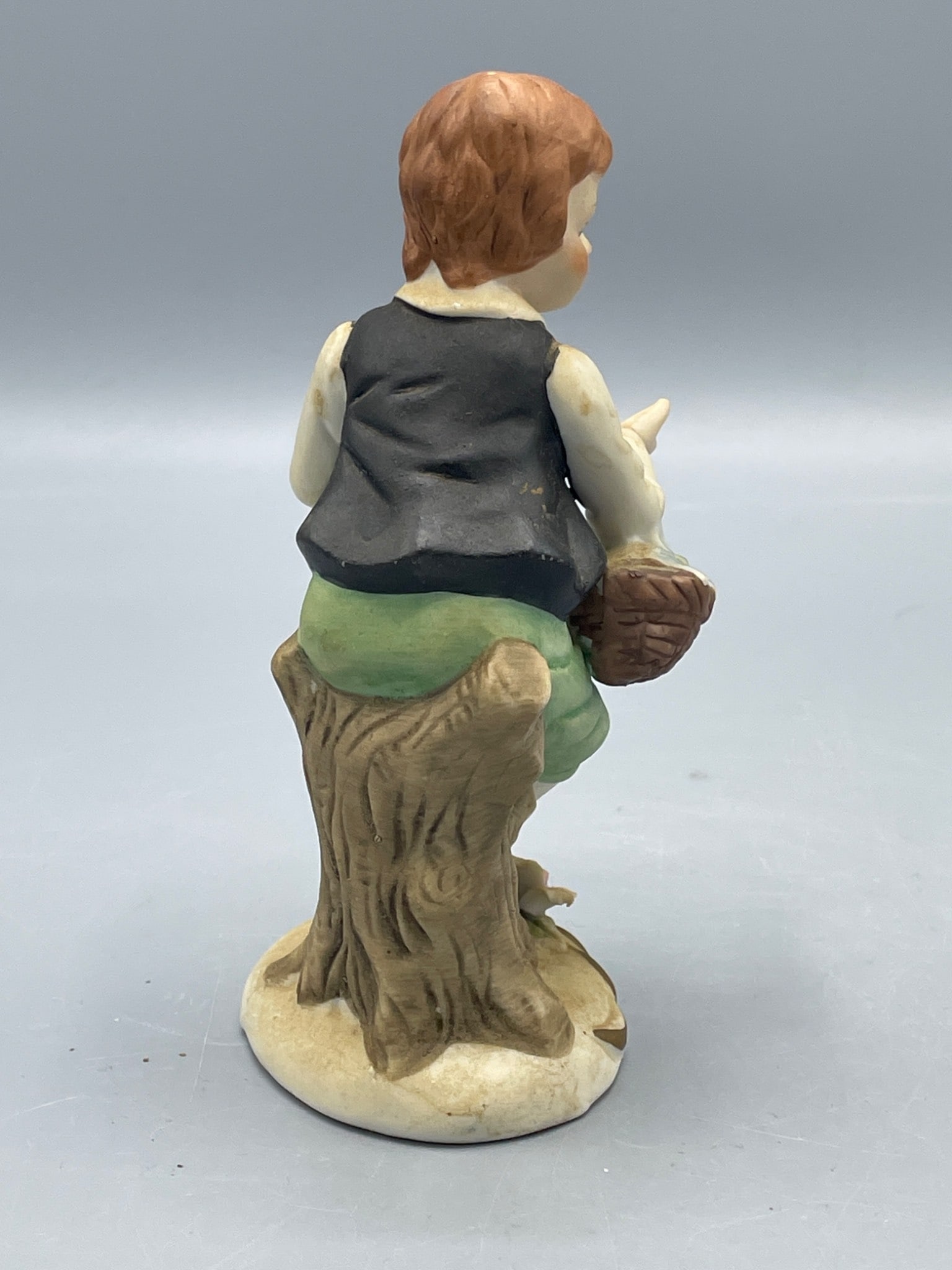 Hand-Painted Porcelain Figurine of a Boy With Basket of Flowers - 3