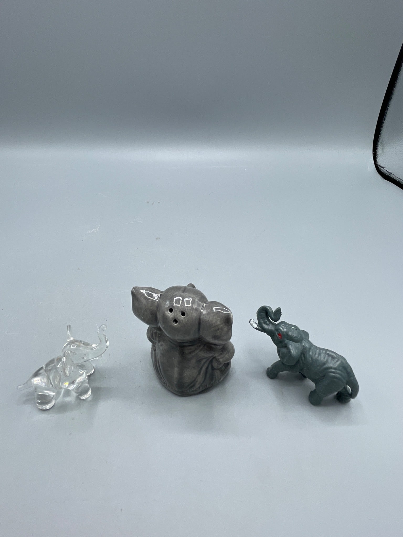 Three Figurines: Clear Glass, Ceramic, and Painted Resin Elephants - 3