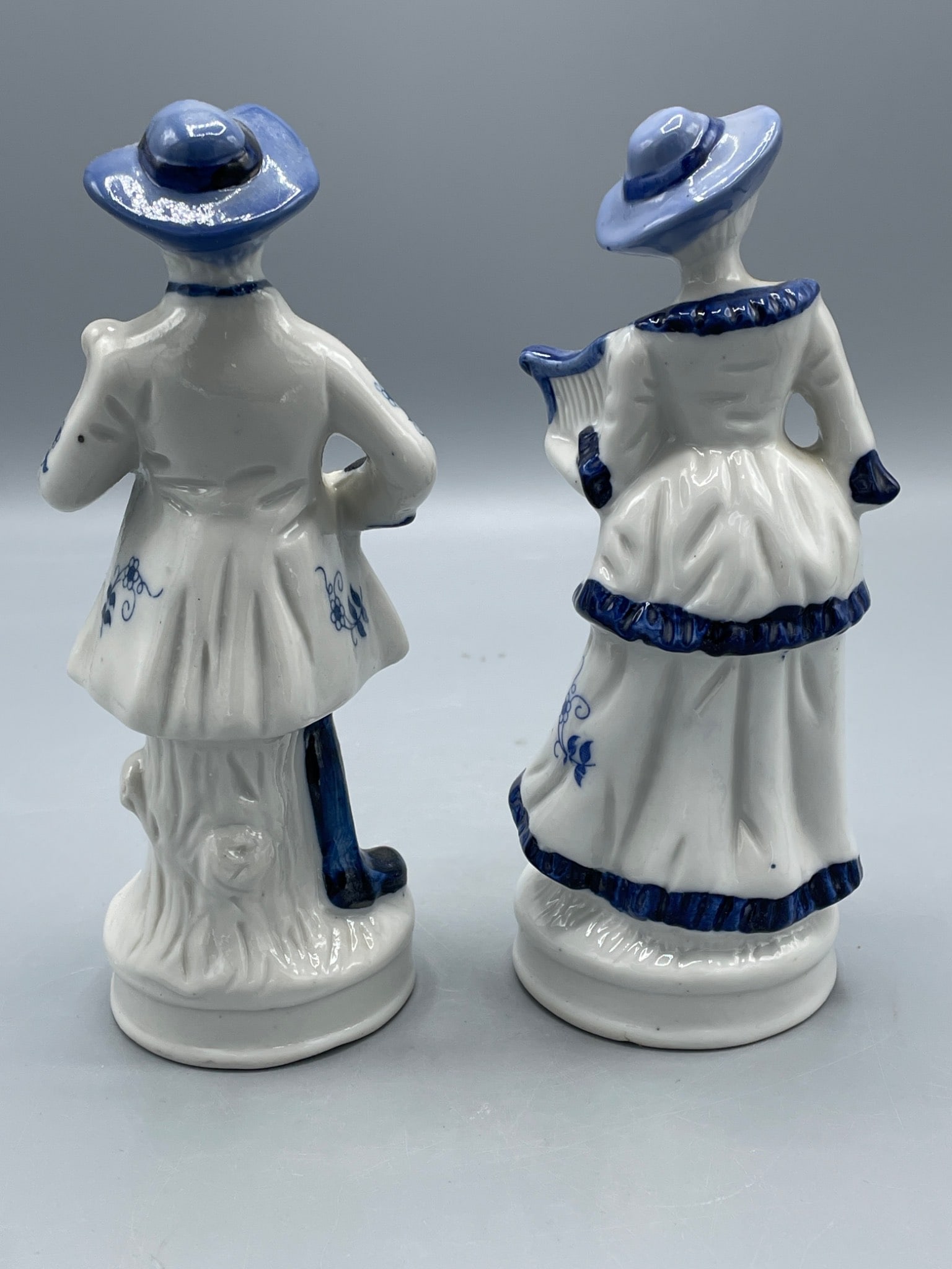 Blue and White Ceramic Figurines Depicting a Man and Woman in Period Clothing - 2