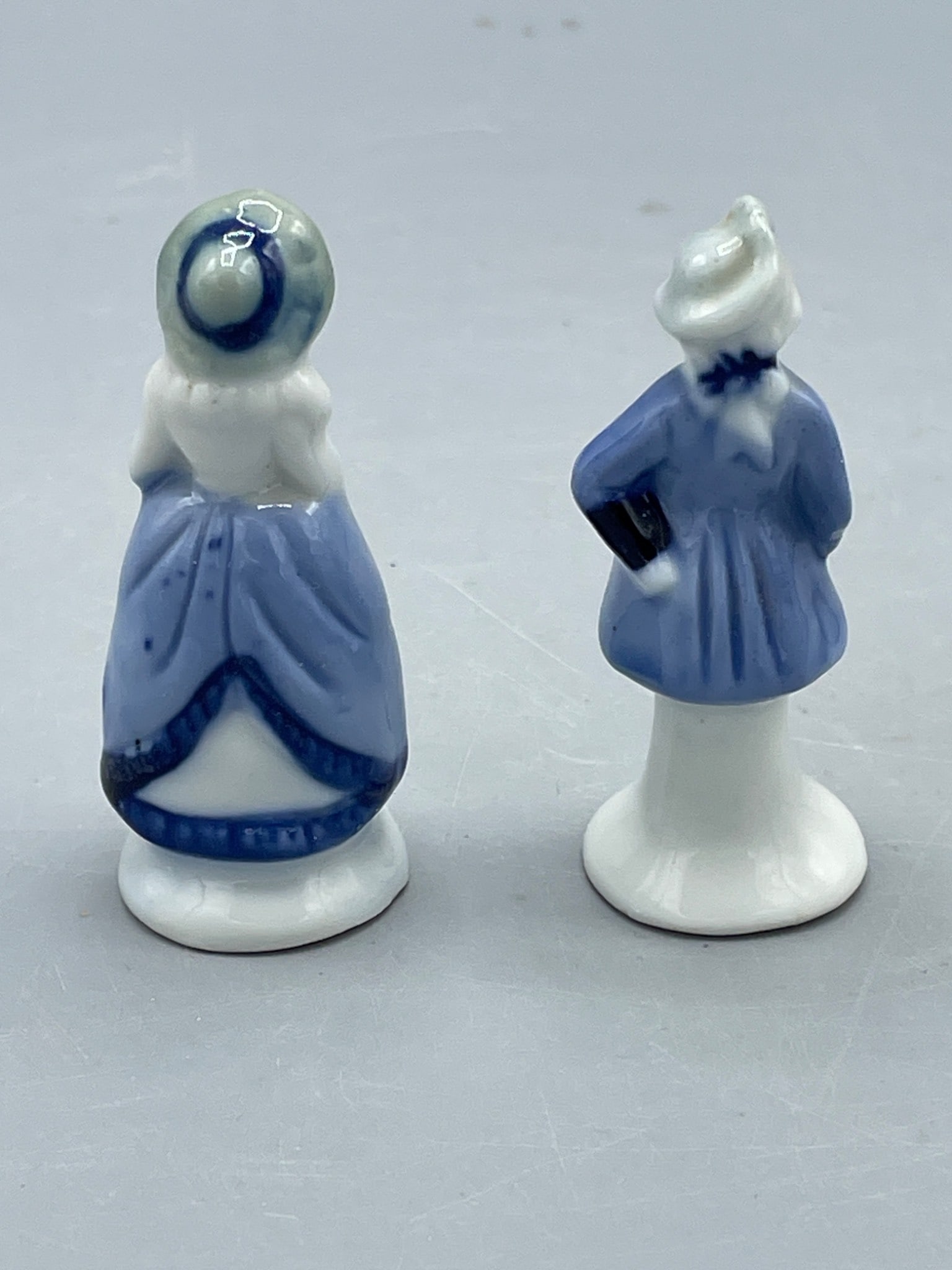Miniature Blue and White Ceramic Figurines in Period Attire - 2